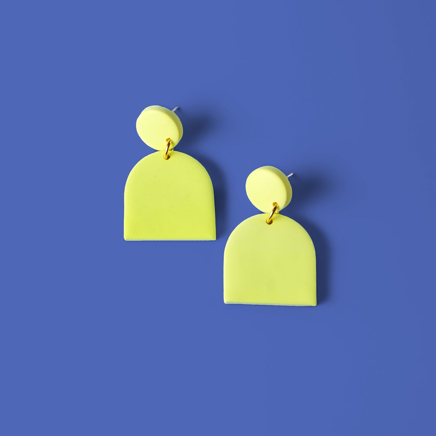 Fun and elegant dome-shaped Alexa Domes dangly earrings in neon yellow #color_neon-yellow