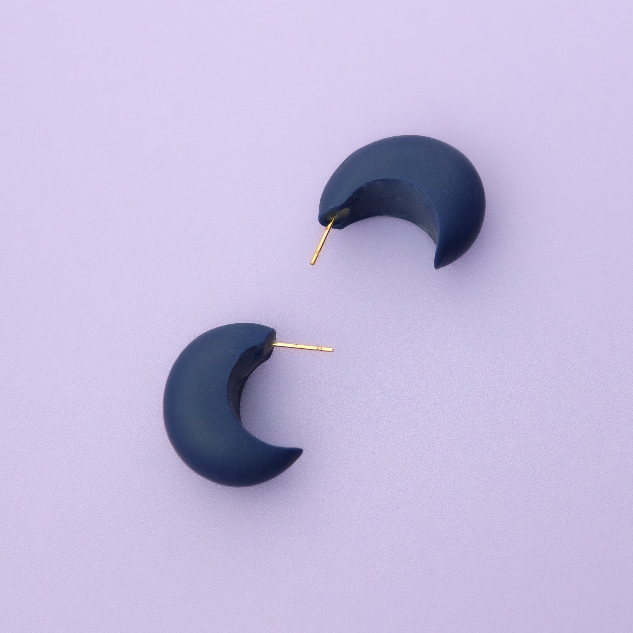 Chunky chubby huggie hoops earrings, statement studs in Navy #color_navy