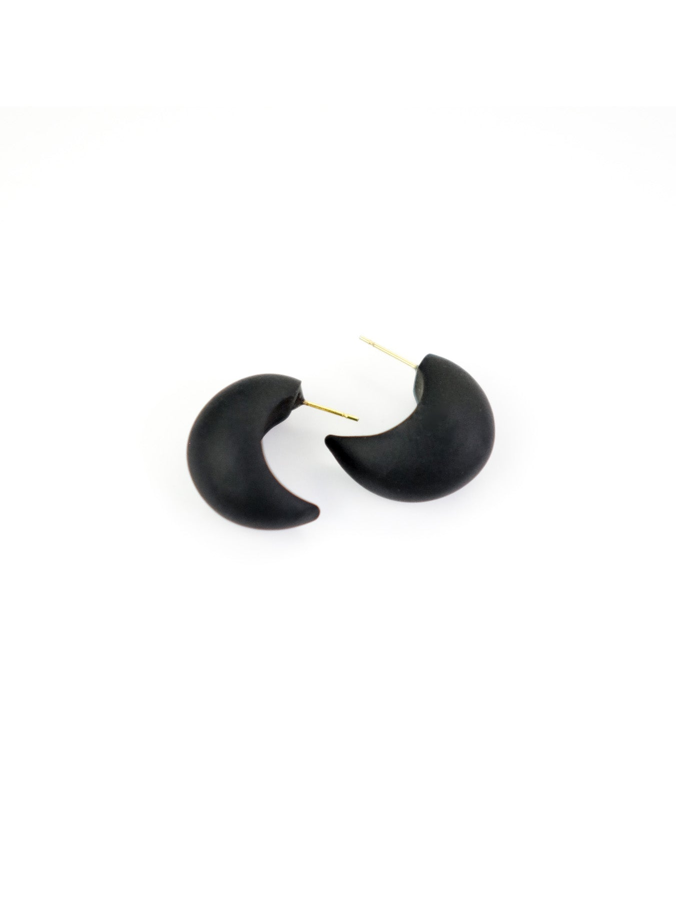 Chubby crescent huggie hoops in inky matte black #color_black
