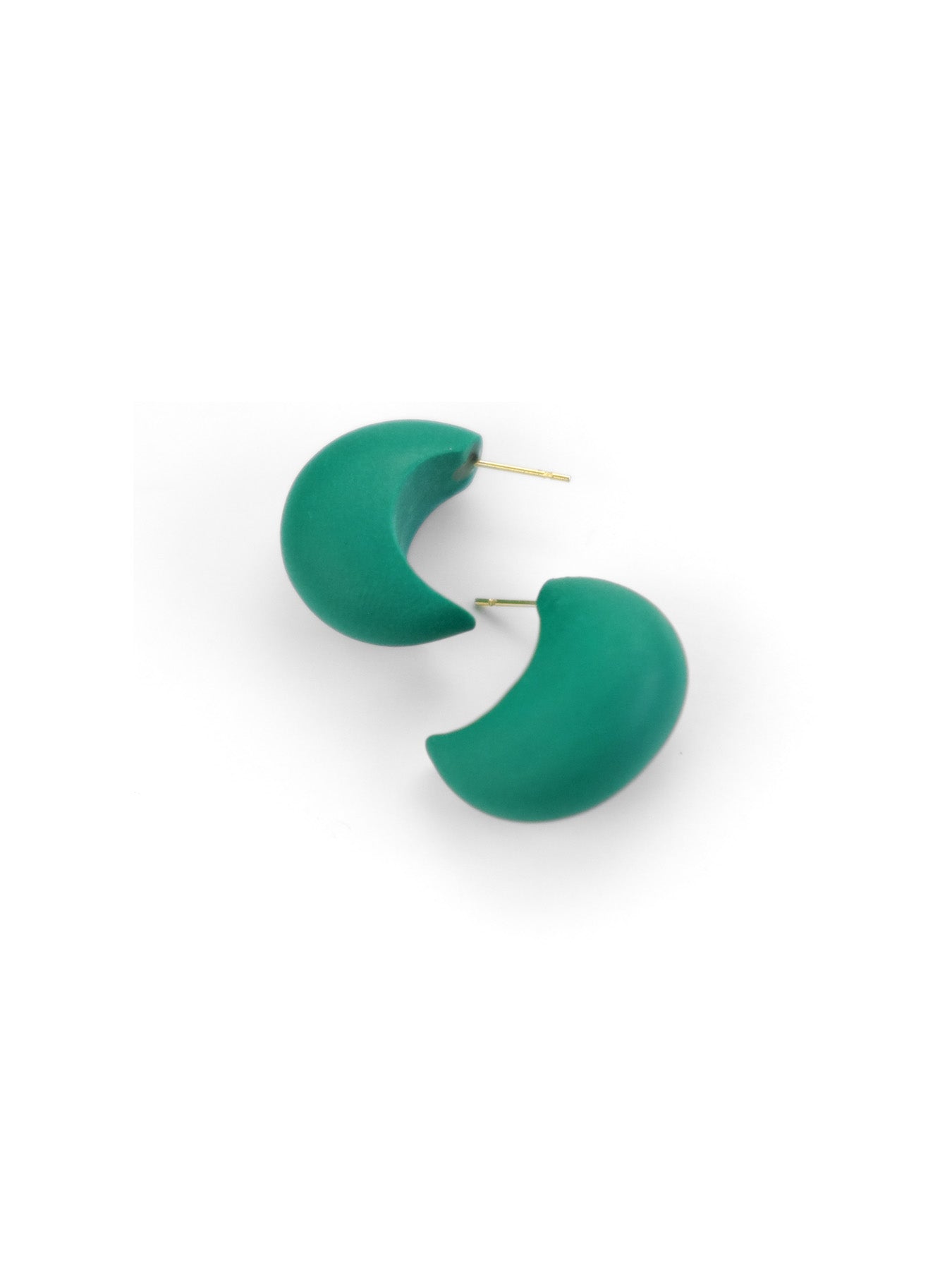 Chubby huggie hoops, smooth matte finish, chunky crescent shape in rich emerald green #color_emerald