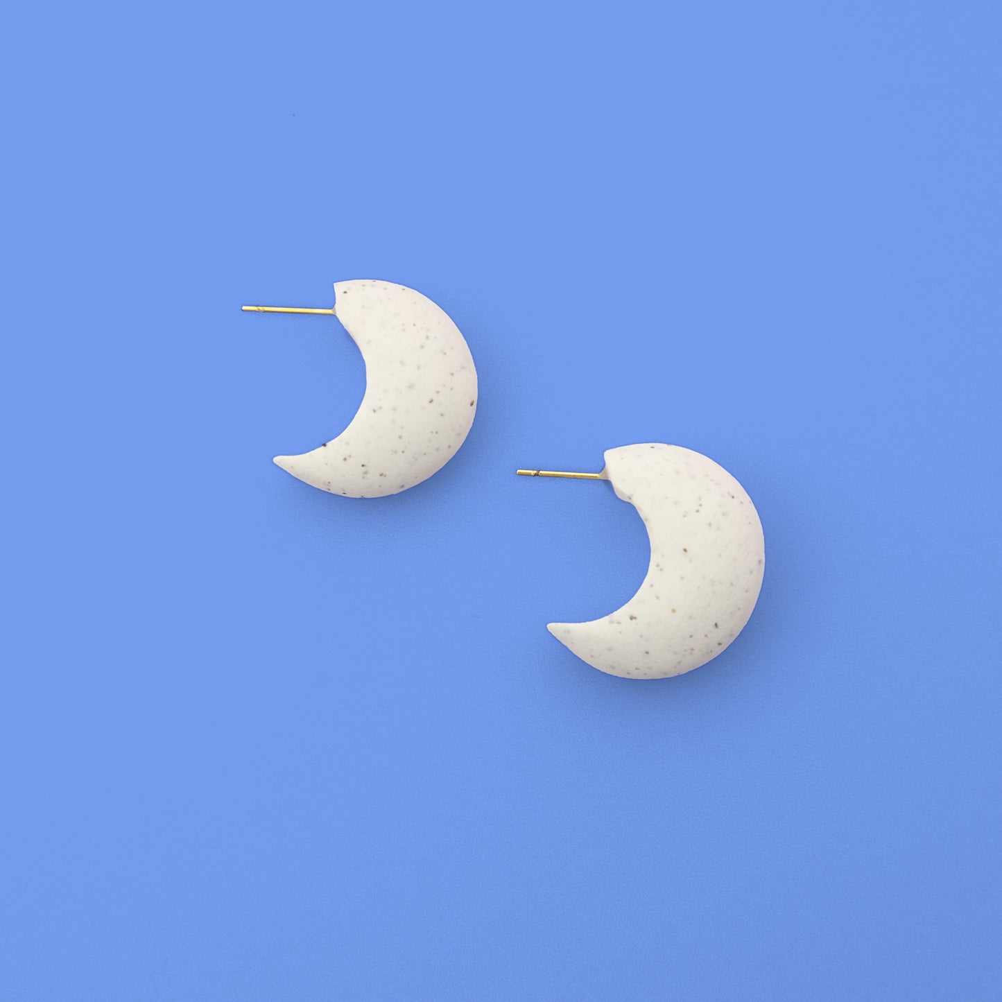 Chunky chubby huggie hoops earrings, statement studs in granite #color_granite