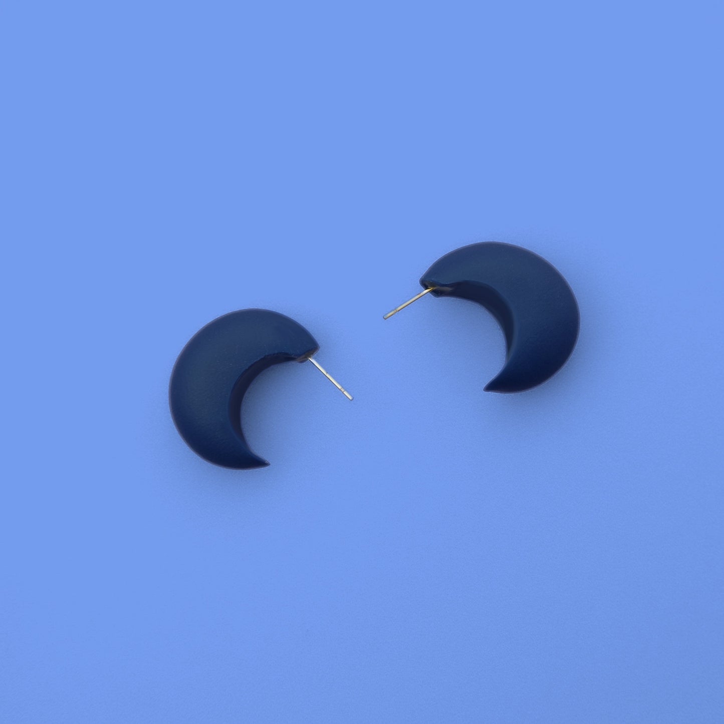 Chunky chubby huggie hoops earrings, statement studs in Navy #color_navy