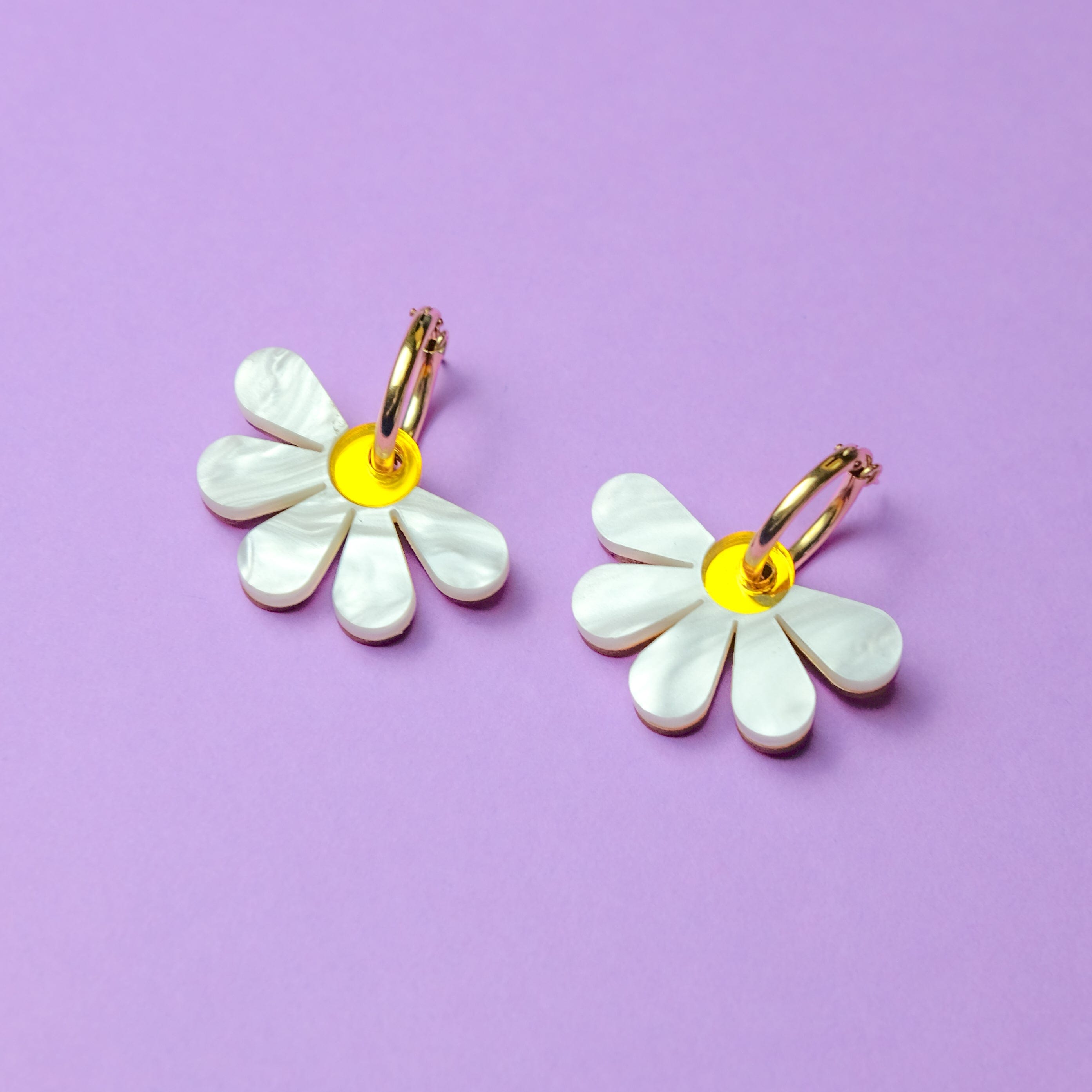 Daisy earrings on gold-filled hoops #color_marbled-white