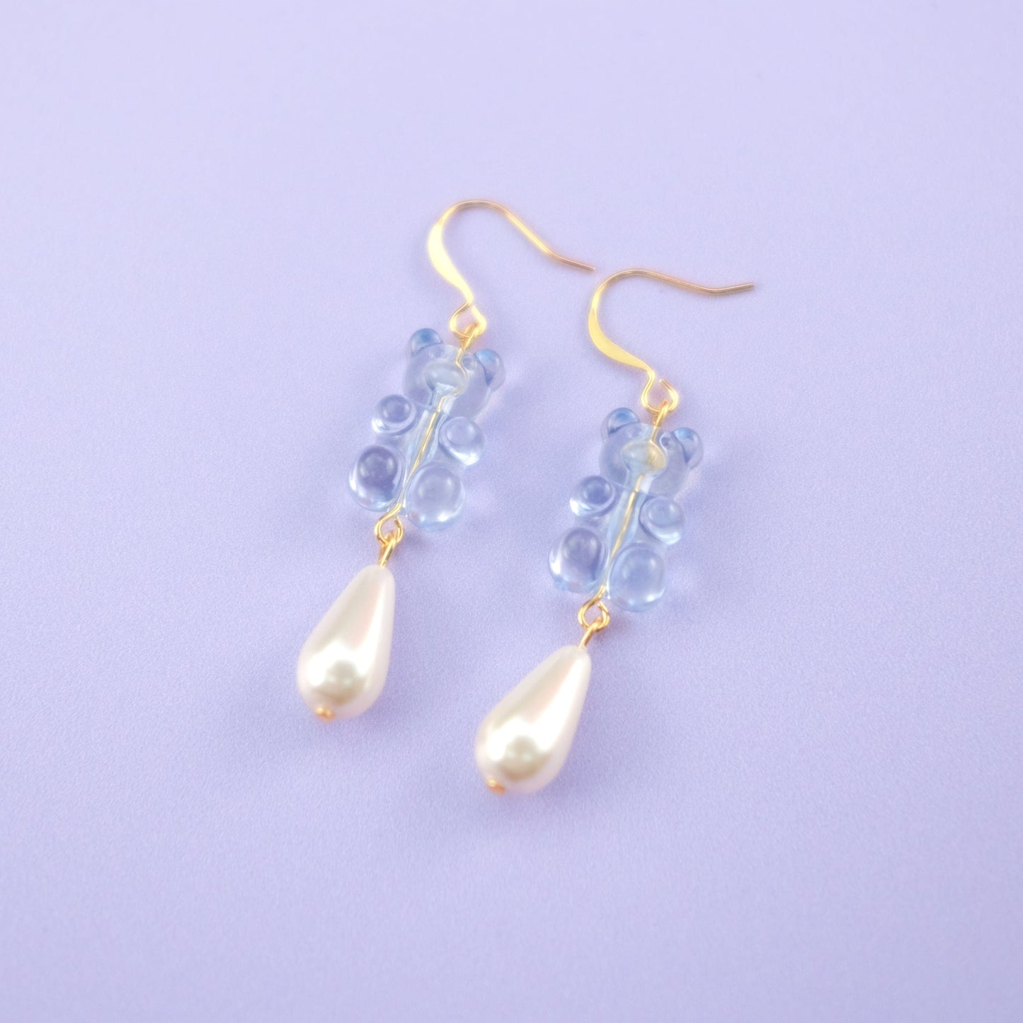 Nostalgic, cute and classy gummy bear dangly earrings with elegant pearl drops #color_baby-blue