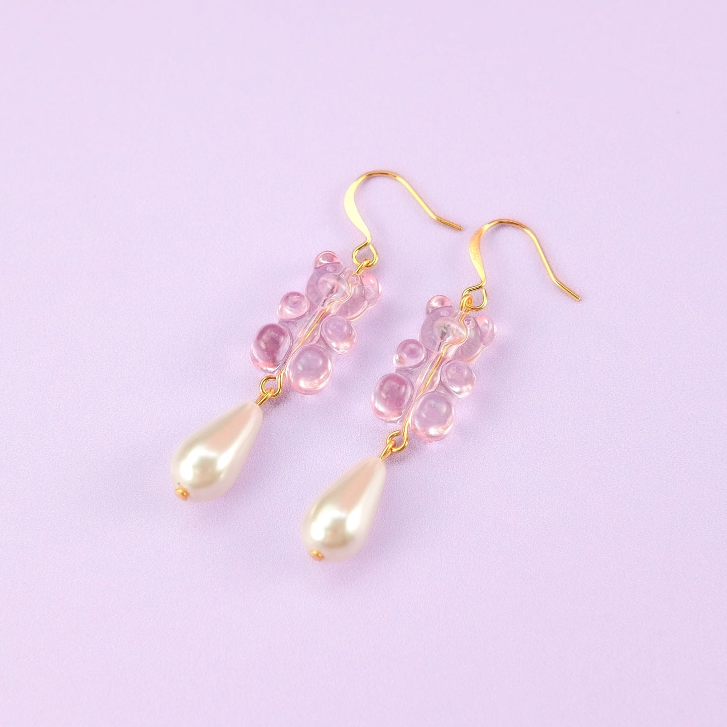Nostalgic, cute and classy gummy bear dangly earrings with elegant pearl drops #color_baby-pink