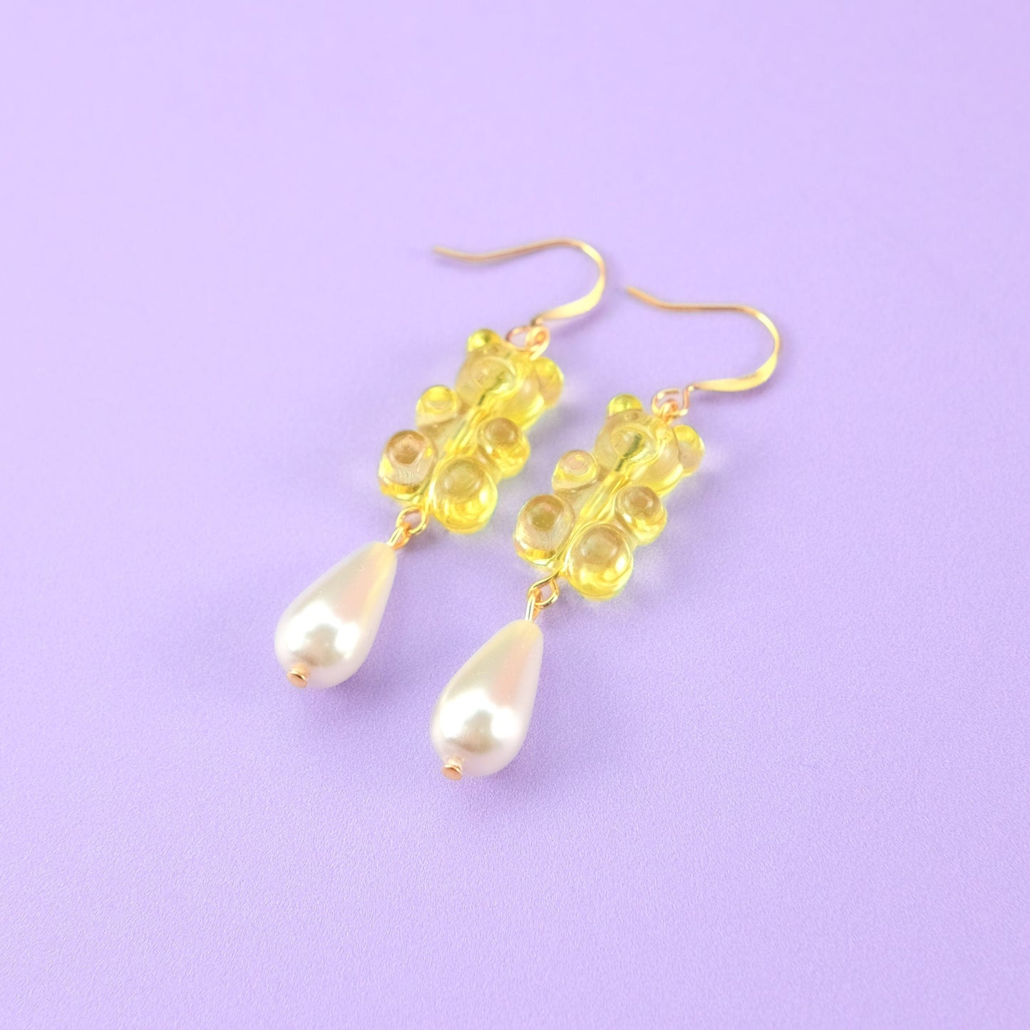 Nostalgic, cute and classy gummy bear dangly earrings with elegant pearl drops #color_yellow