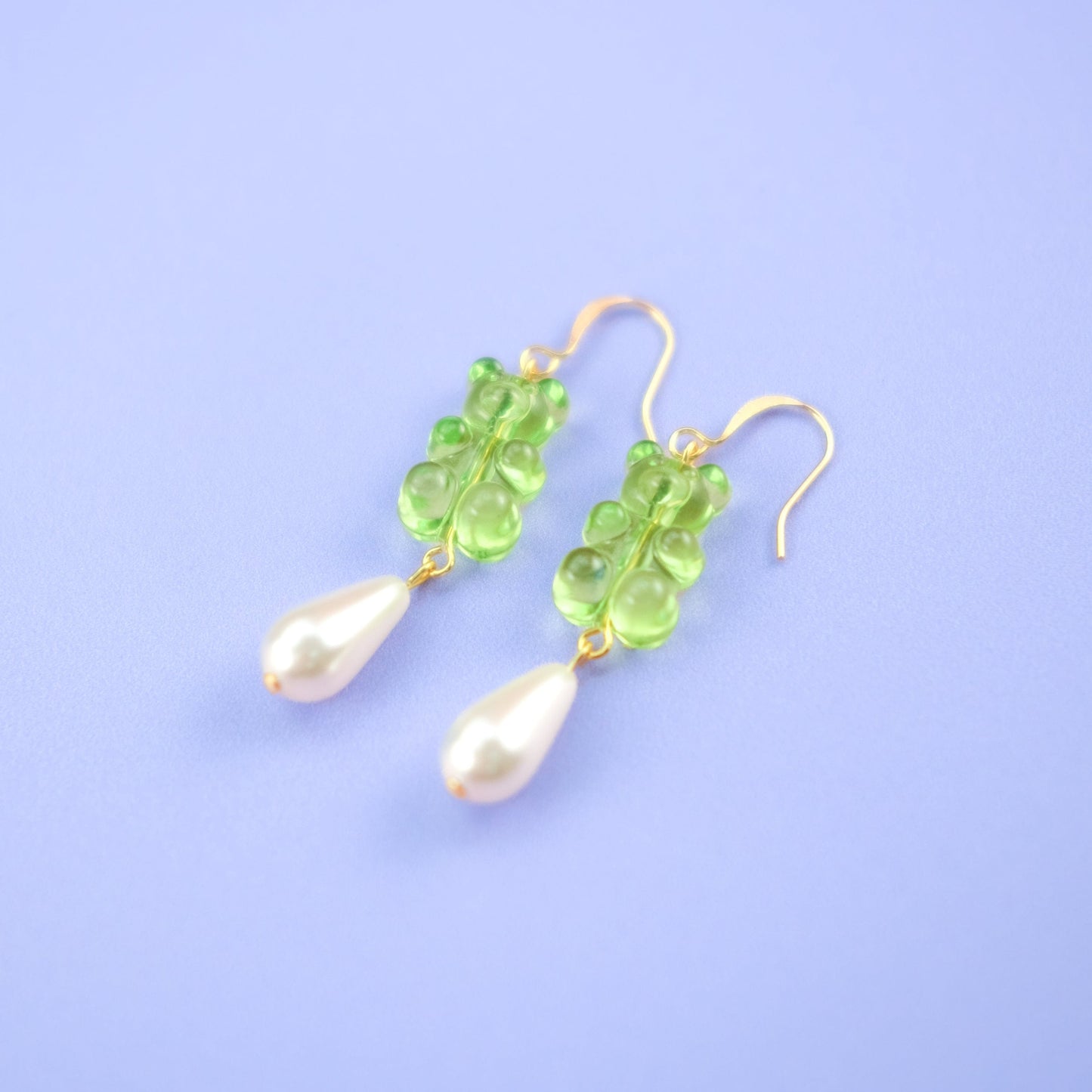 Nostalgic, cute and classy gummy bear dangly earrings with elegant pearl drops #color_lime-green