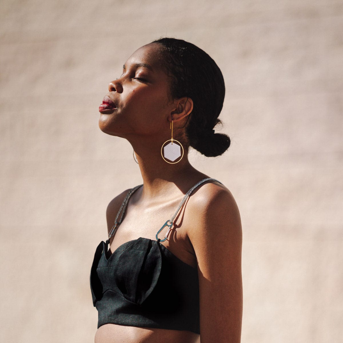 Hex Halo Dangly hexagon shaped elegant and lightweight white and gold earrings #color_white-textured-lines