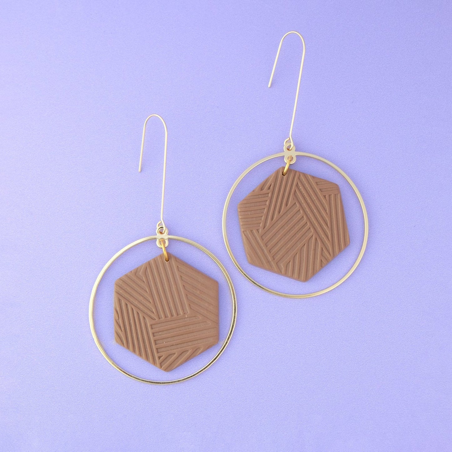Hex Halo Dangly hexagon shaped elegant and lightweight white and gold earrings #color_mocha