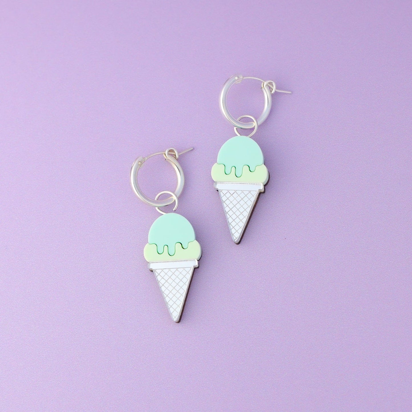 Mint green or pistachio ice cream cone hoop earrings By Chavelli, featuring a dainty sterling silver hoop with a sweet ice cream cone charm in green #color_pistachio