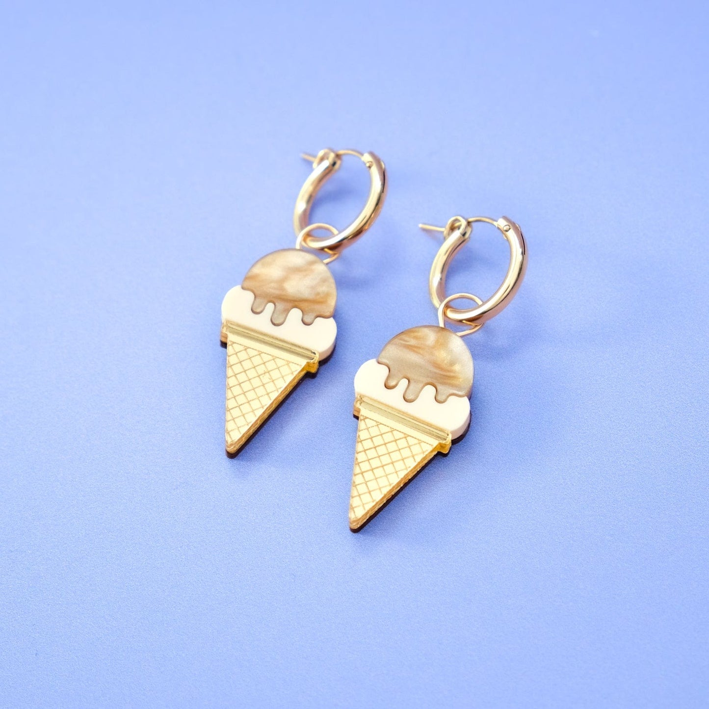 Gold hoops with mocha ice cream dangle charms, playful, reflective, enamel-like finish, creamy drip detail #color_mocha