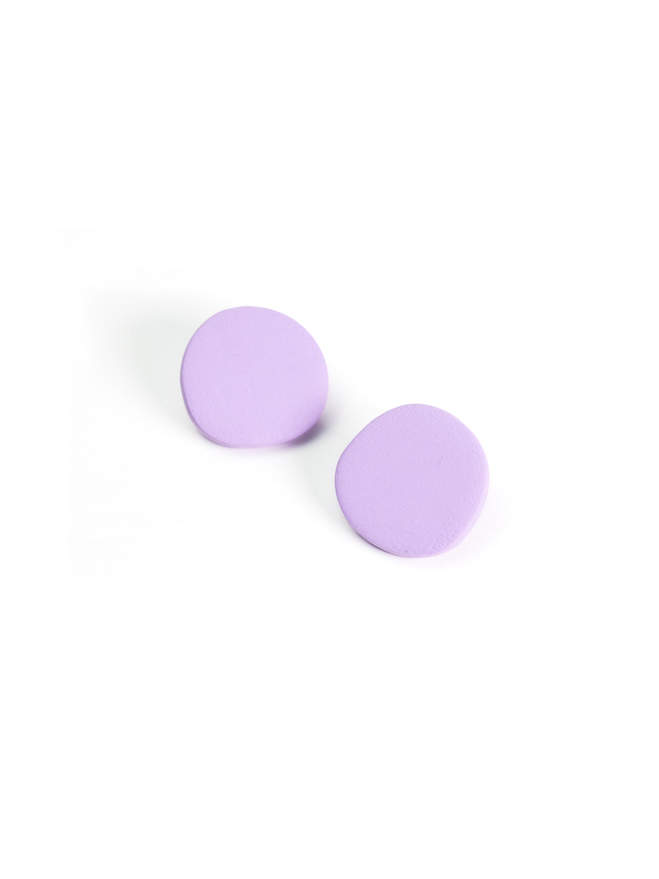 Minimal pebble studs, matte lavender domes with soft organic edges for an effortless pop of color #color_lavender