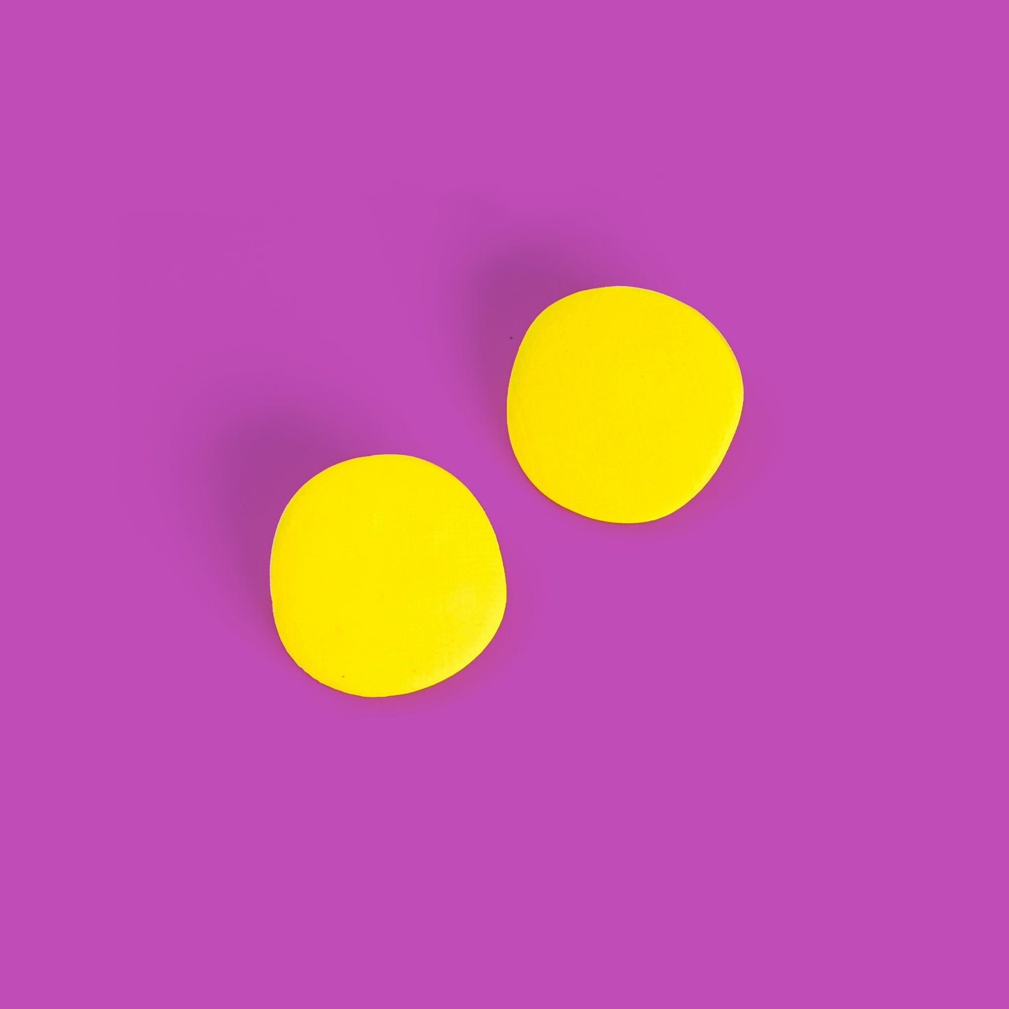 Miro inspired organic round shaped studs with canvas texture in yellow #color_yellow