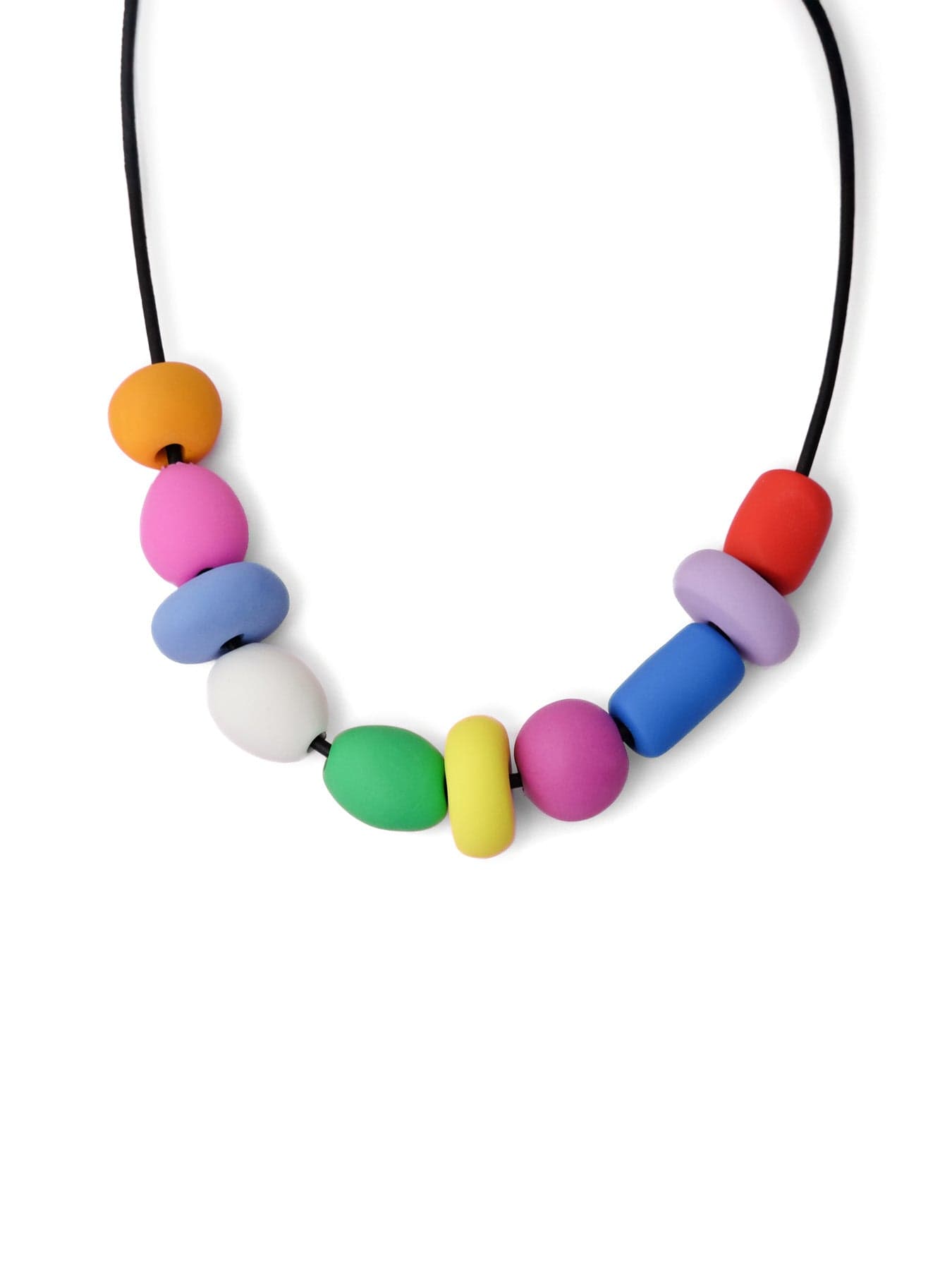 Mixed-shape rainbow bead necklace, smooth finish, airy, vibrant, bold rounded beads on black cord #color_ rainbow
