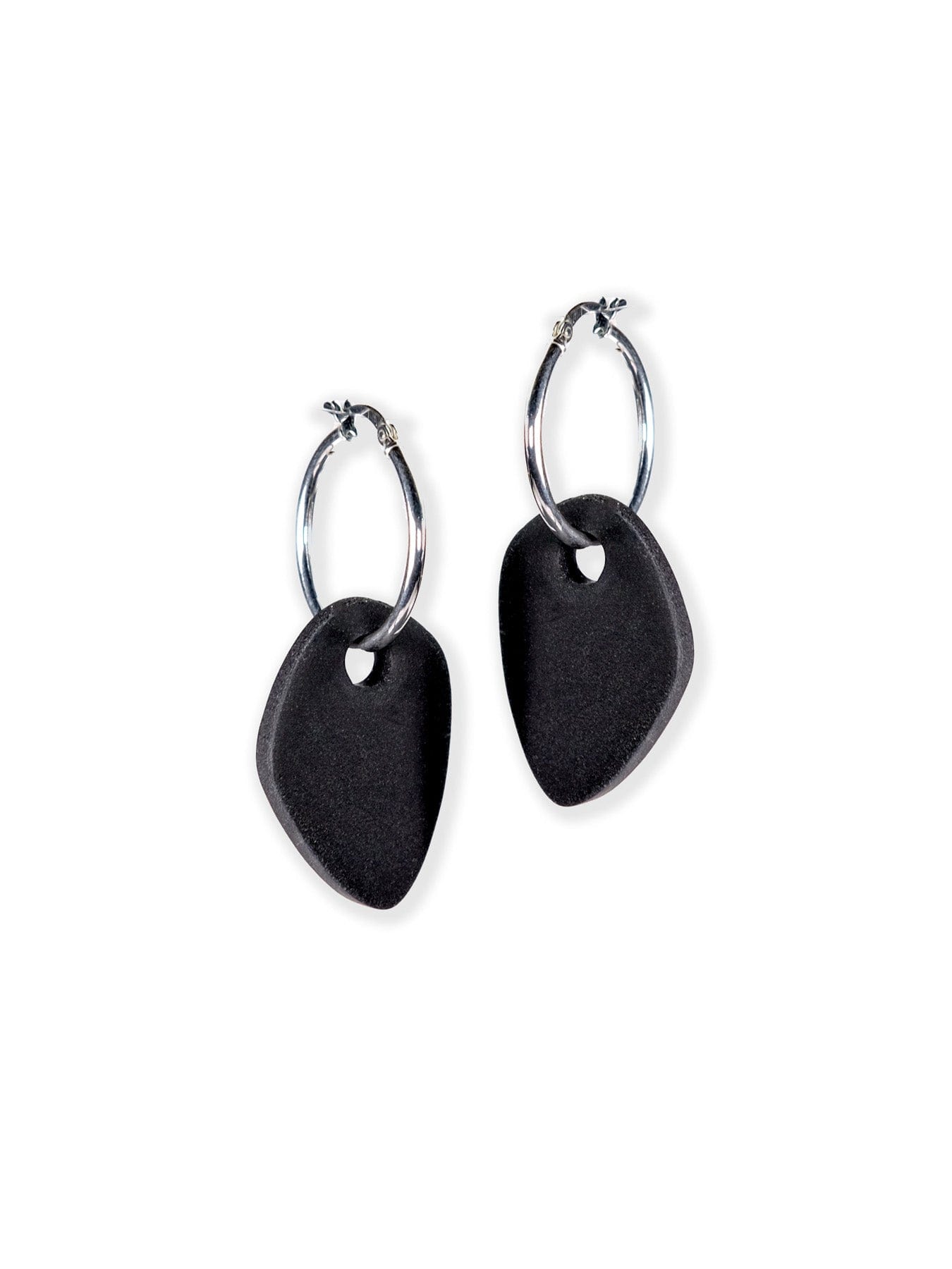 Black modern-art drop charm hoop earrings, matte, lightweight, organic, asymmetrical pebble shapes on silver hoops #color_black-silver