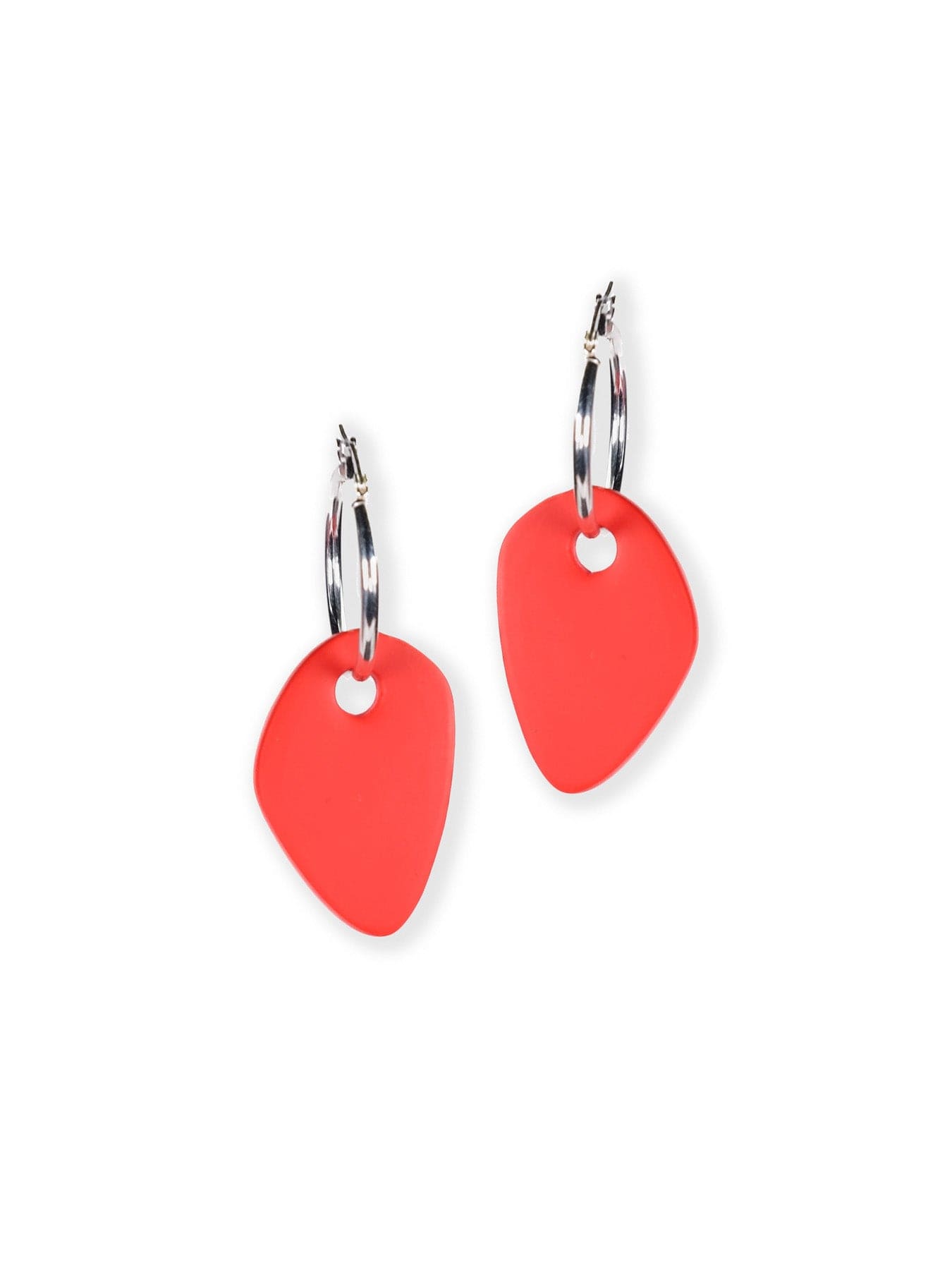 Bright red abstract drop earrings, satin-matte, airy, rounded triangular shape, small circular cutout on silver hoops #color_red