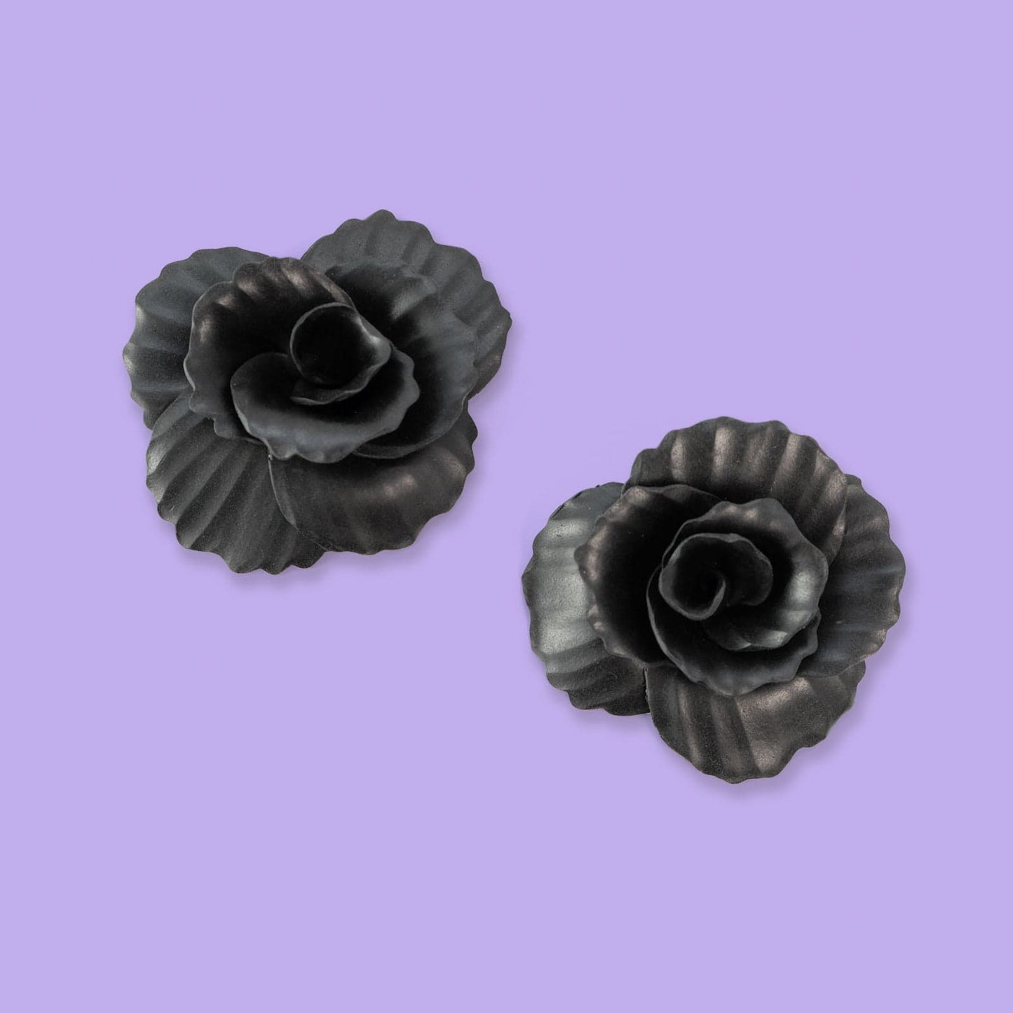 Hand-made statement flower rosette stud earrings in black #color_black