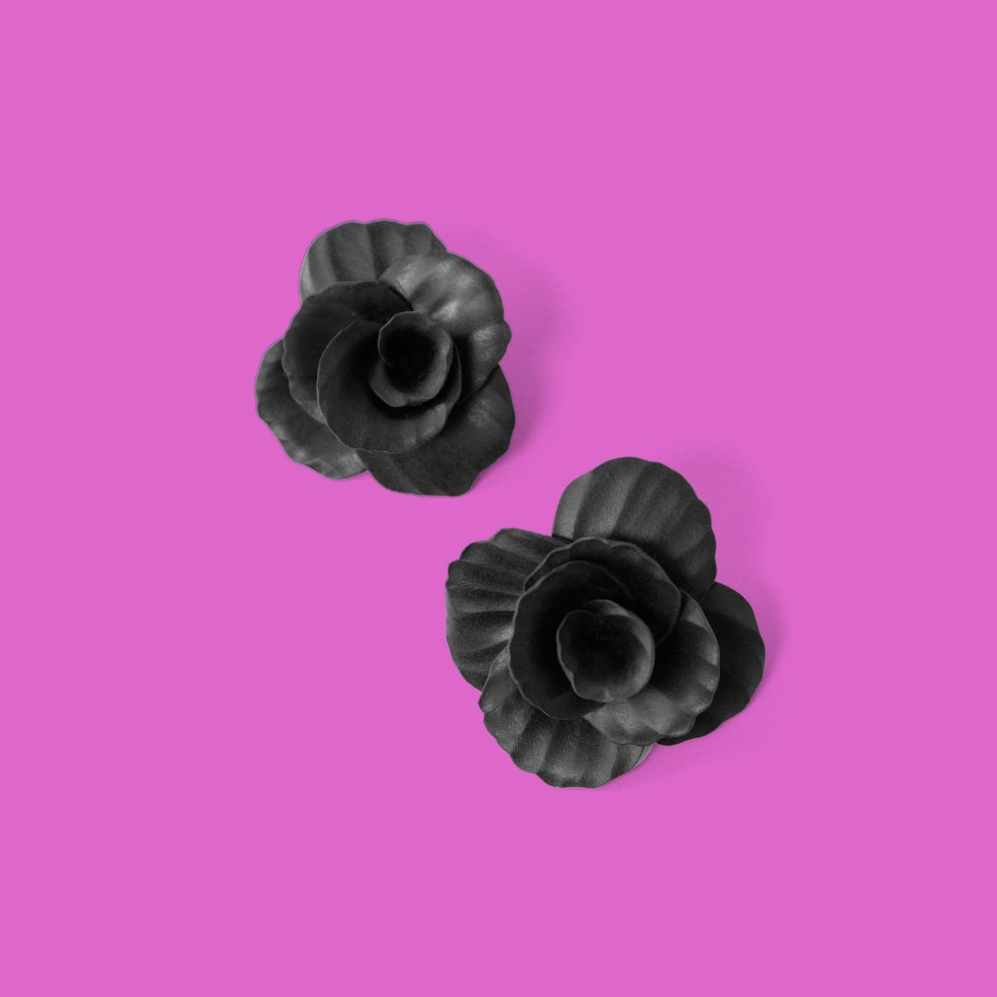 Hand-made statement flower rosette stud earrings in black #color_black