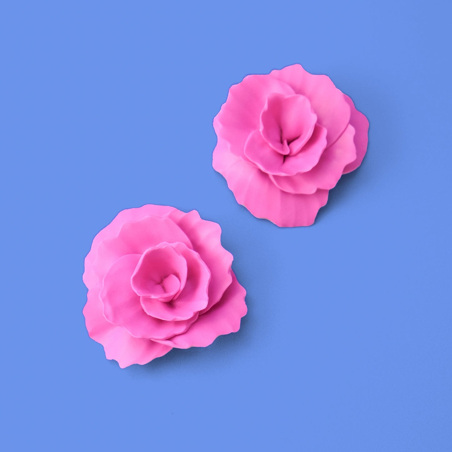 Hand-made statement flower rosette stud earrings in hot pink #color_hot-pink