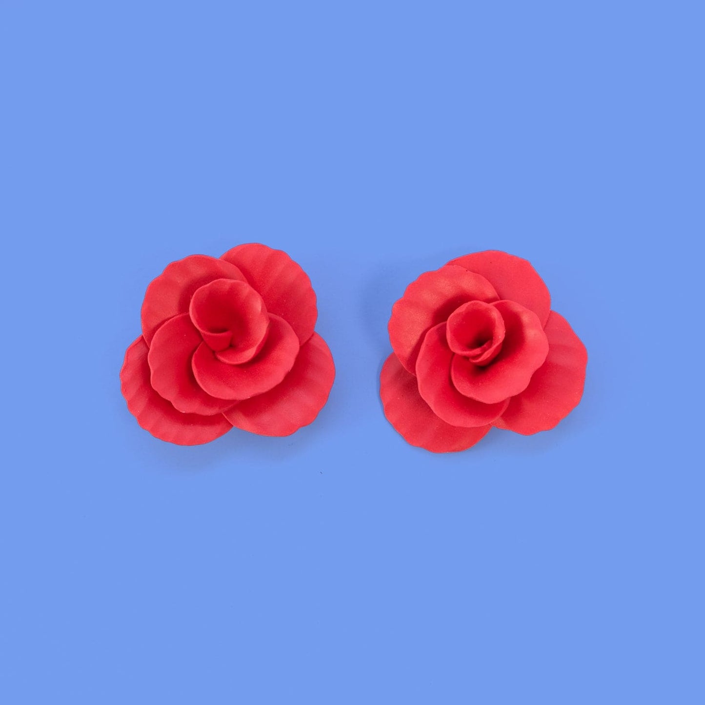 Hand-made statement flower rosette stud earrings in red #color_red
