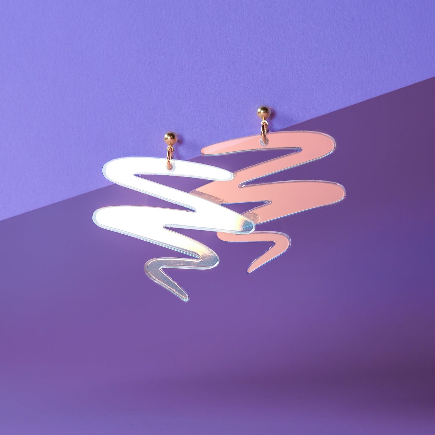 Unique, eye-catching, lightweight and cute Squiggle dangly earrings in iridescent #color_iridescent