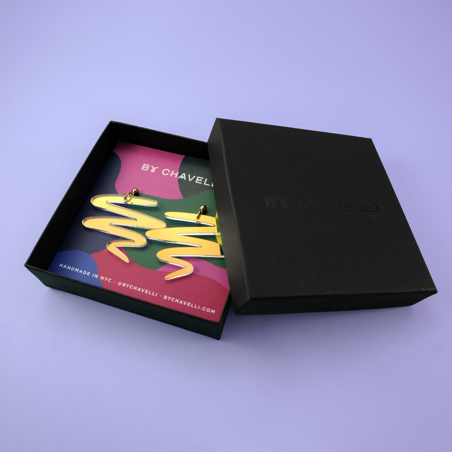 Unique, eye-catching, lightweight and cute Squiggle dangly earrings in iridescent #color_iridescent