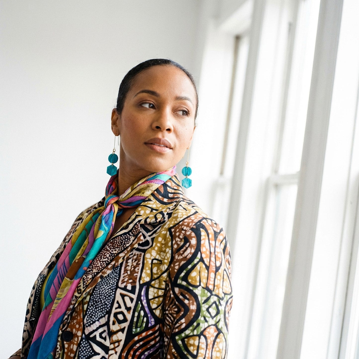 Elegant, elongated and lightweight Belle Dangles geometric dangly earrings in pearly mediterranean blue #color_mediterranean-blue