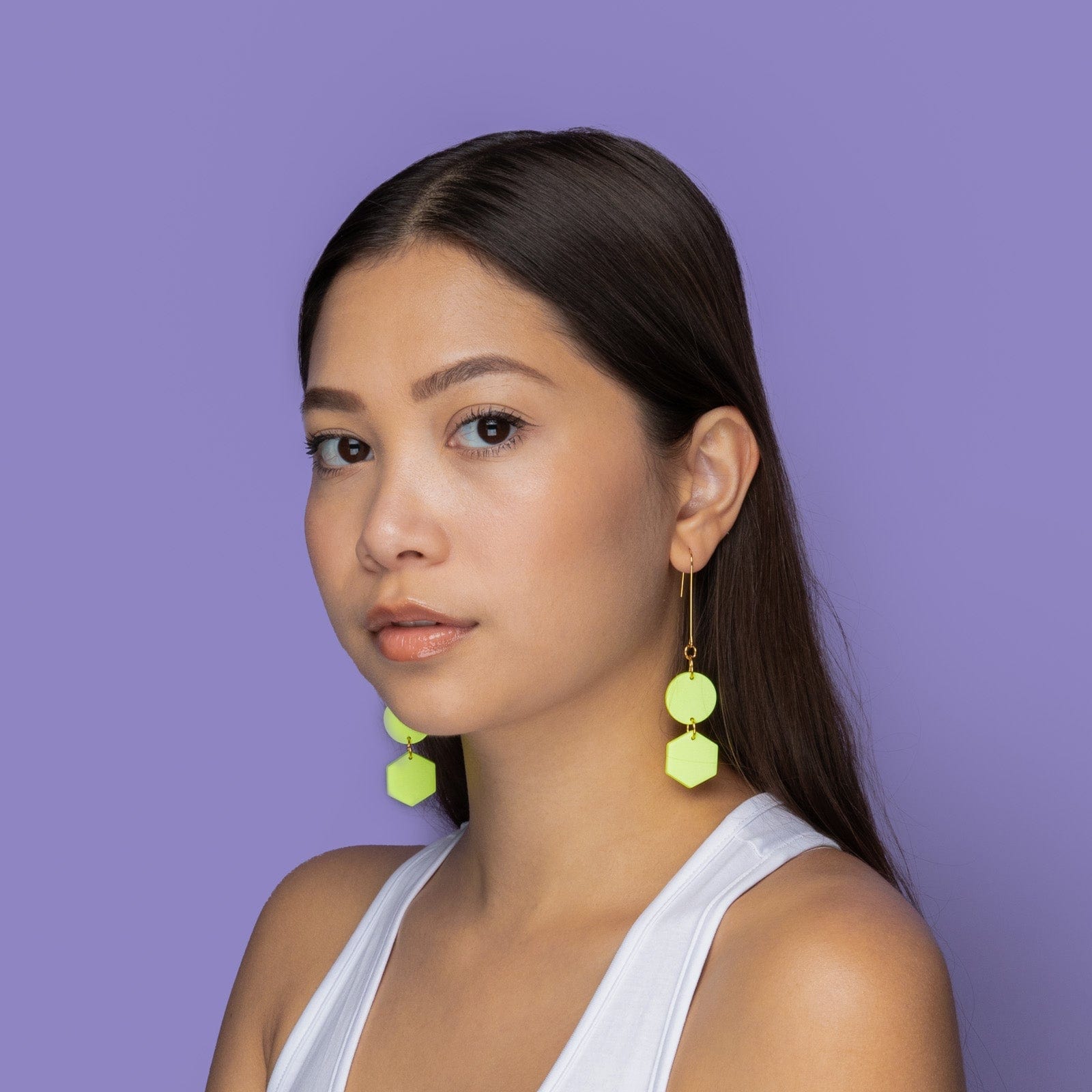 Elegant, elongated and lightweight Belle Dangles geometric dangly earrings in bright neon yellow #color_neon-yellow