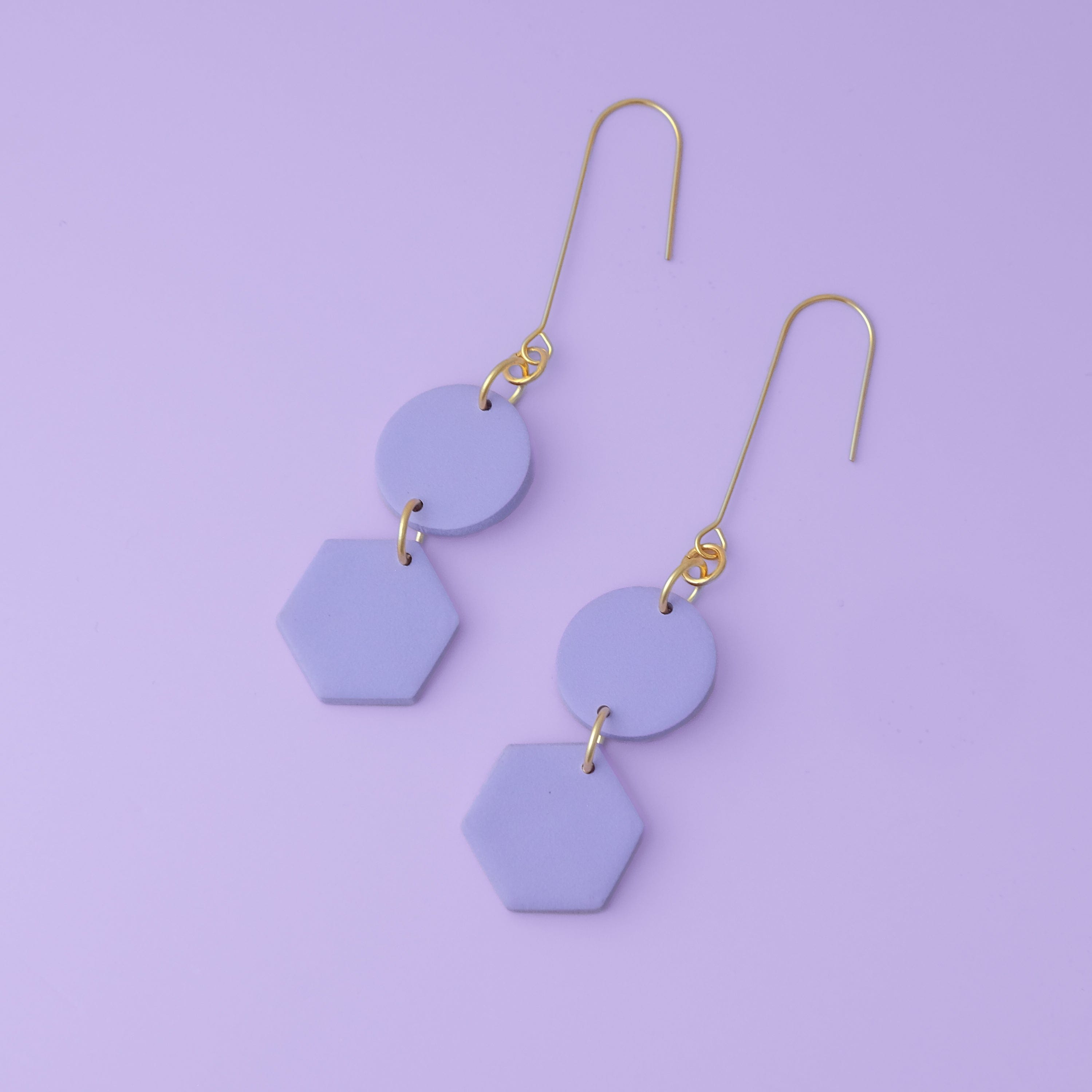 Elegant, elongated and lightweight Belle Dangles geometric dangly earrings in lavender #color_lavender