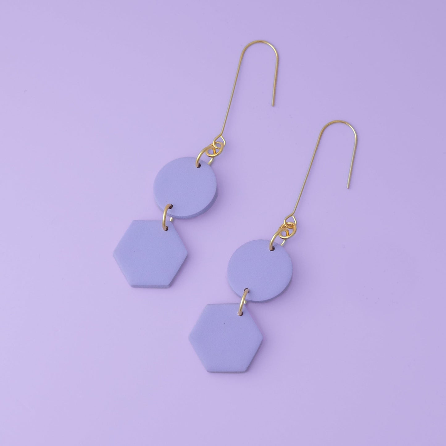 Elegant, elongated and lightweight Belle Dangles geometric dangly earrings in lavender #color_lavender