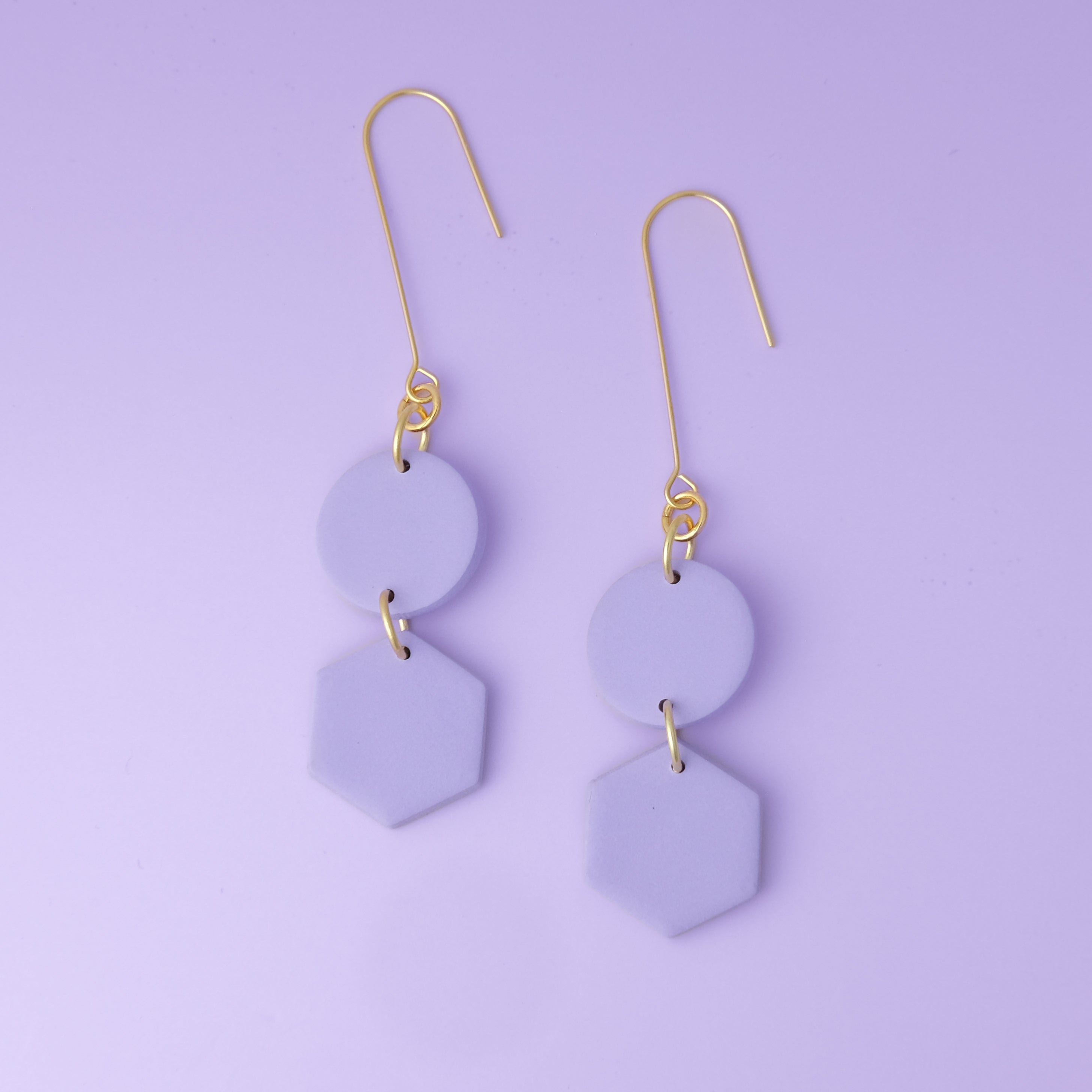 Elegant, elongated and lightweight Belle Dangles geometric dangly earrings in lavender #color_lavender