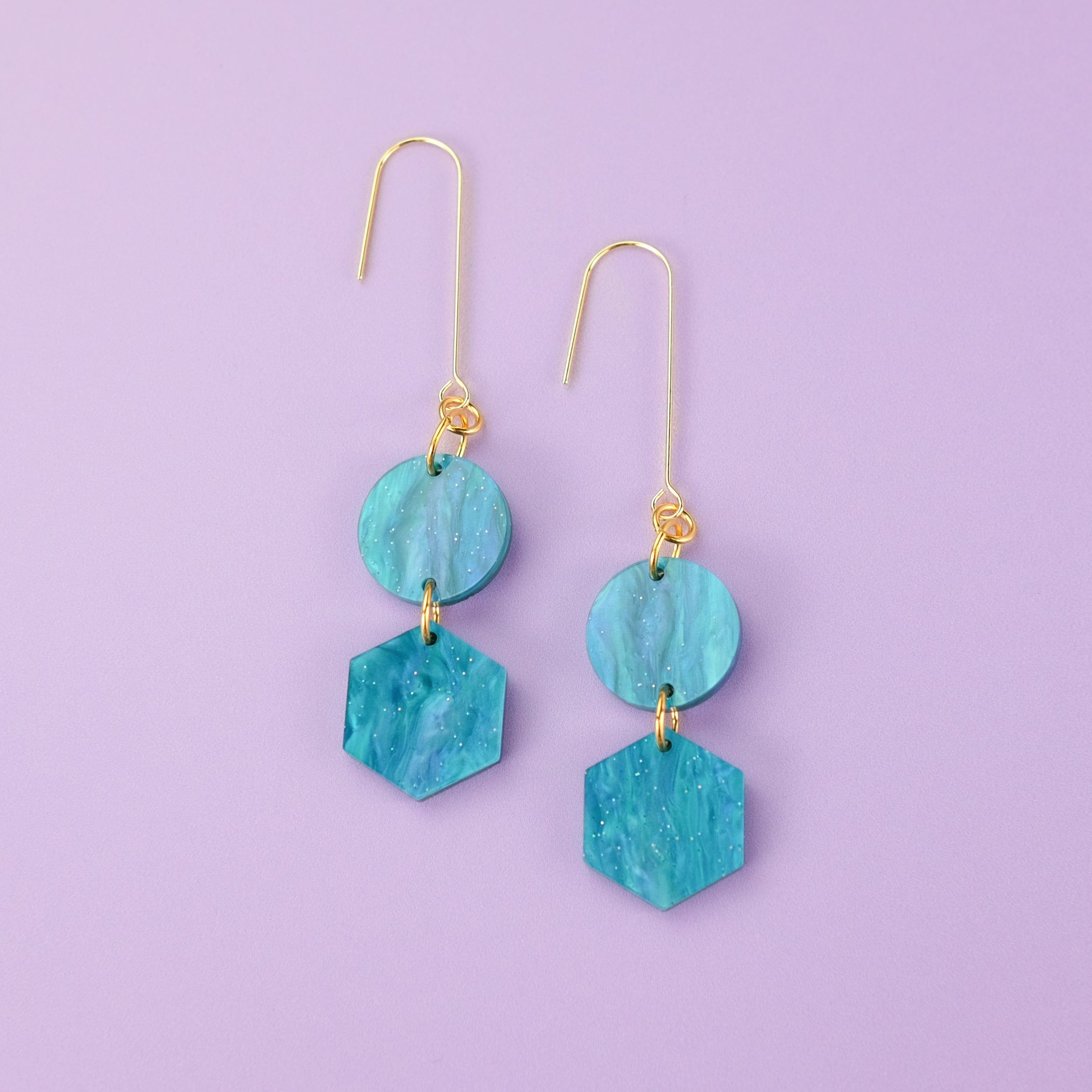 Elegant, elongated and lightweight Belle Dangles geometric dangly earrings in pearly mediterranean blue #color_mediterranean-blue
