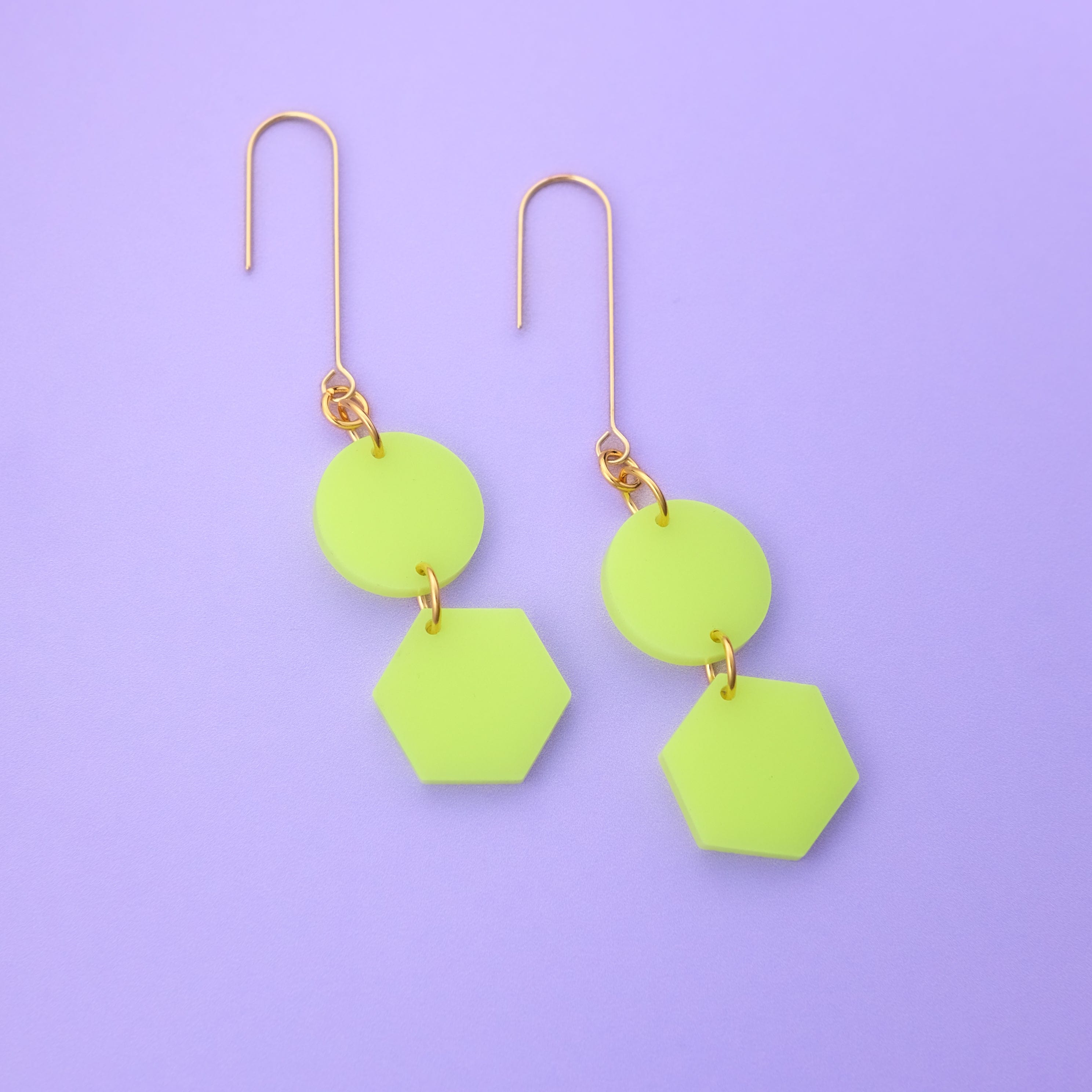 Elegant, elongated and lightweight Belle Dangles geometric dangly earrings in bright neon yellow #color_neon-yellow