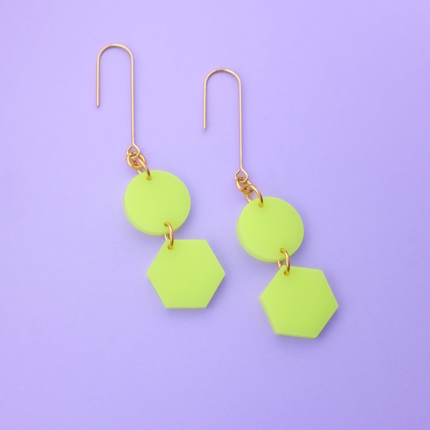 Elegant, elongated and lightweight Belle Dangles geometric dangly earrings in bright neon yellow #color_neon-yellow