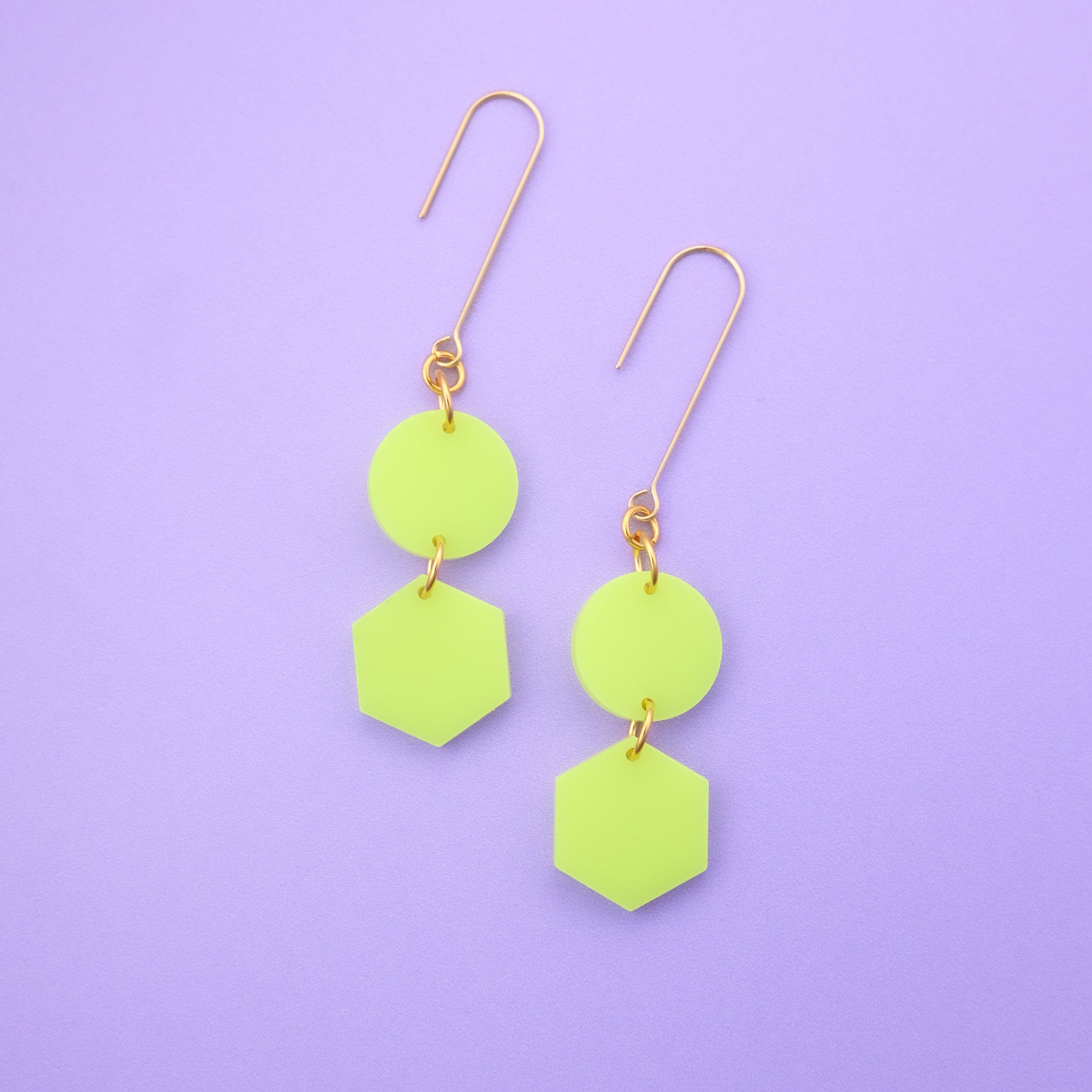 Elegant, elongated and lightweight Belle Dangles geometric dangly earrings in bright neon yellow #color_neon-yellow