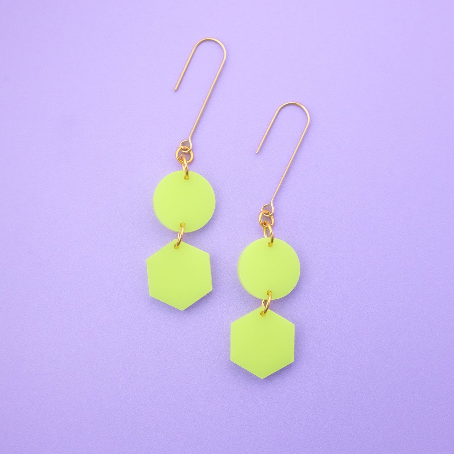 Elegant, elongated and lightweight Belle Dangles geometric dangly earrings in bright neon yellow #color_neon-yellow