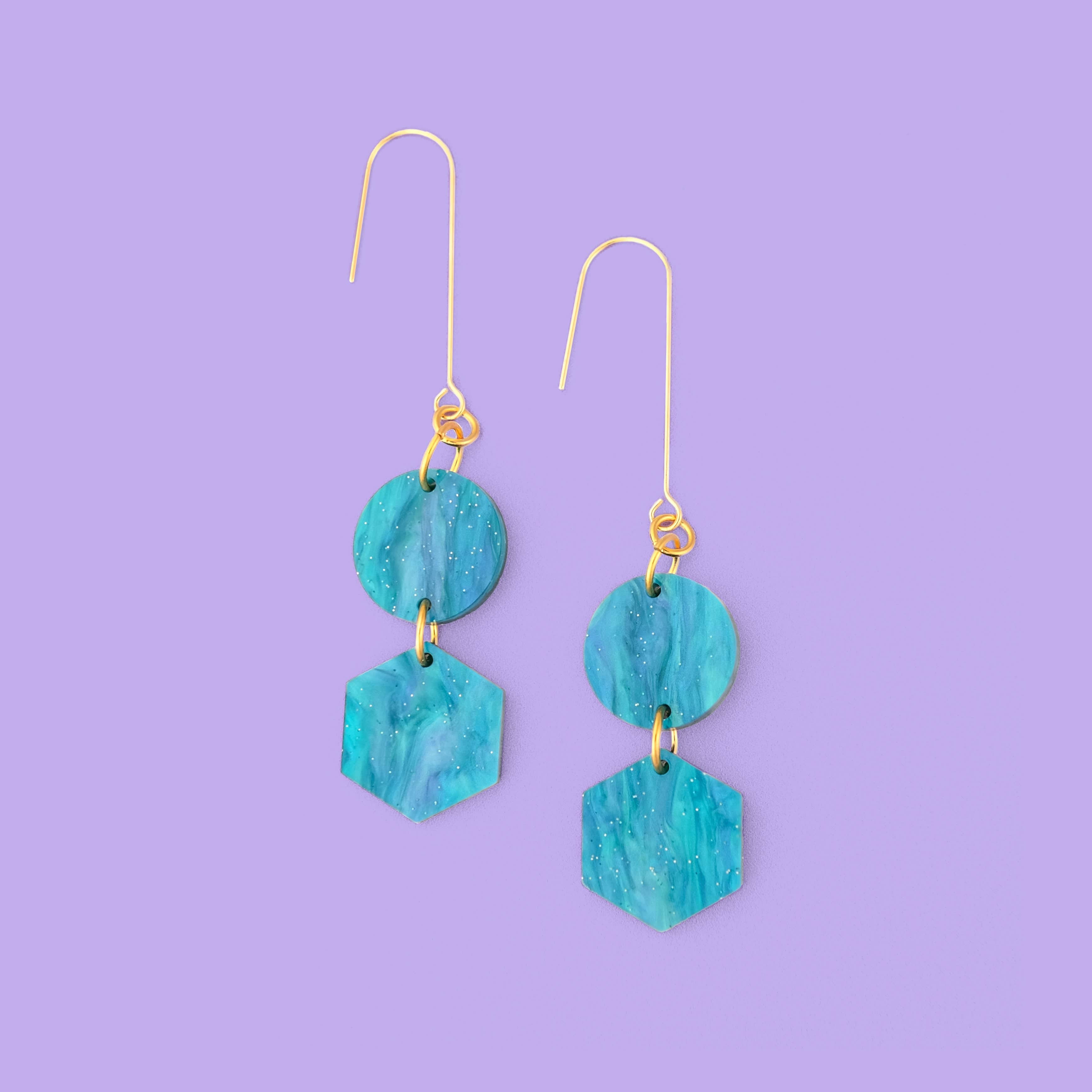 Elegant, elongated and lightweight Belle Dangles geometric dangly earrings in pearly mediterranean blue #color_mediterranean-blue