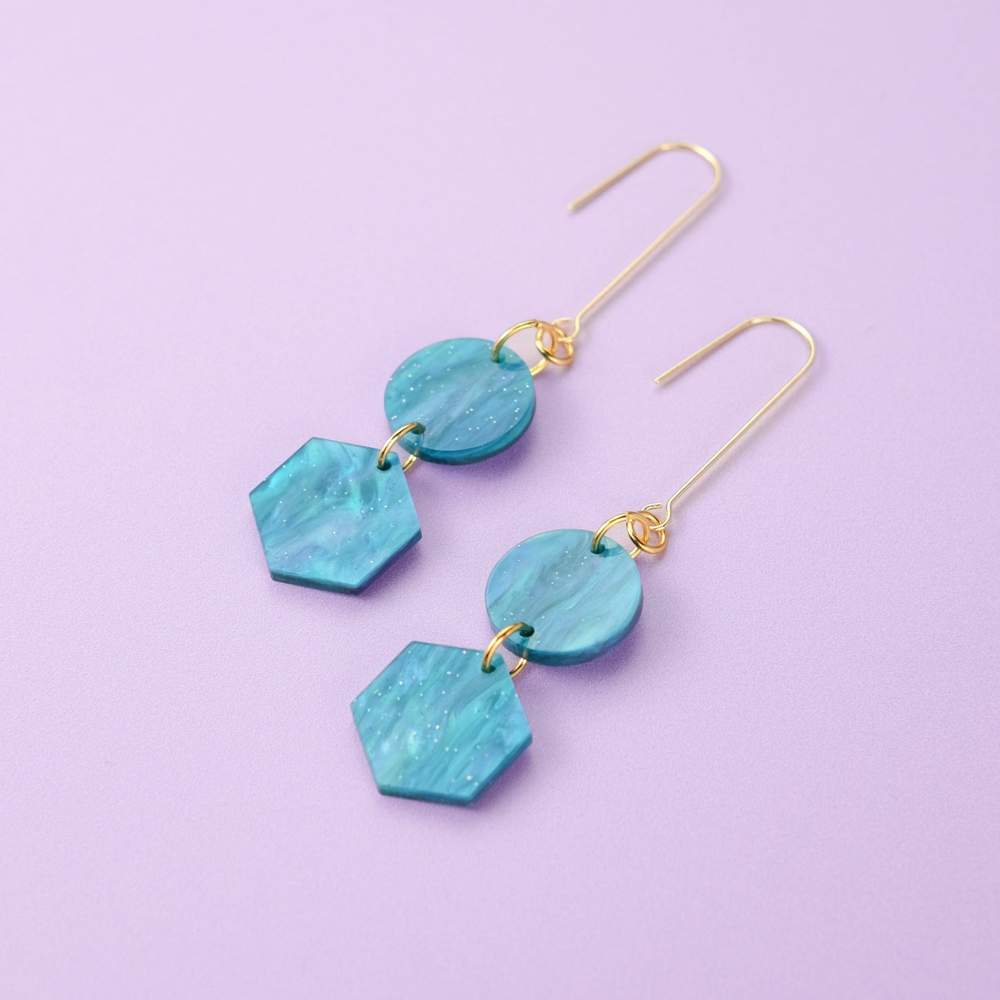 Elegant, elongated and lightweight Belle Dangles geometric dangly earrings in pearly mediterranean blue #color_mediterranean-blue