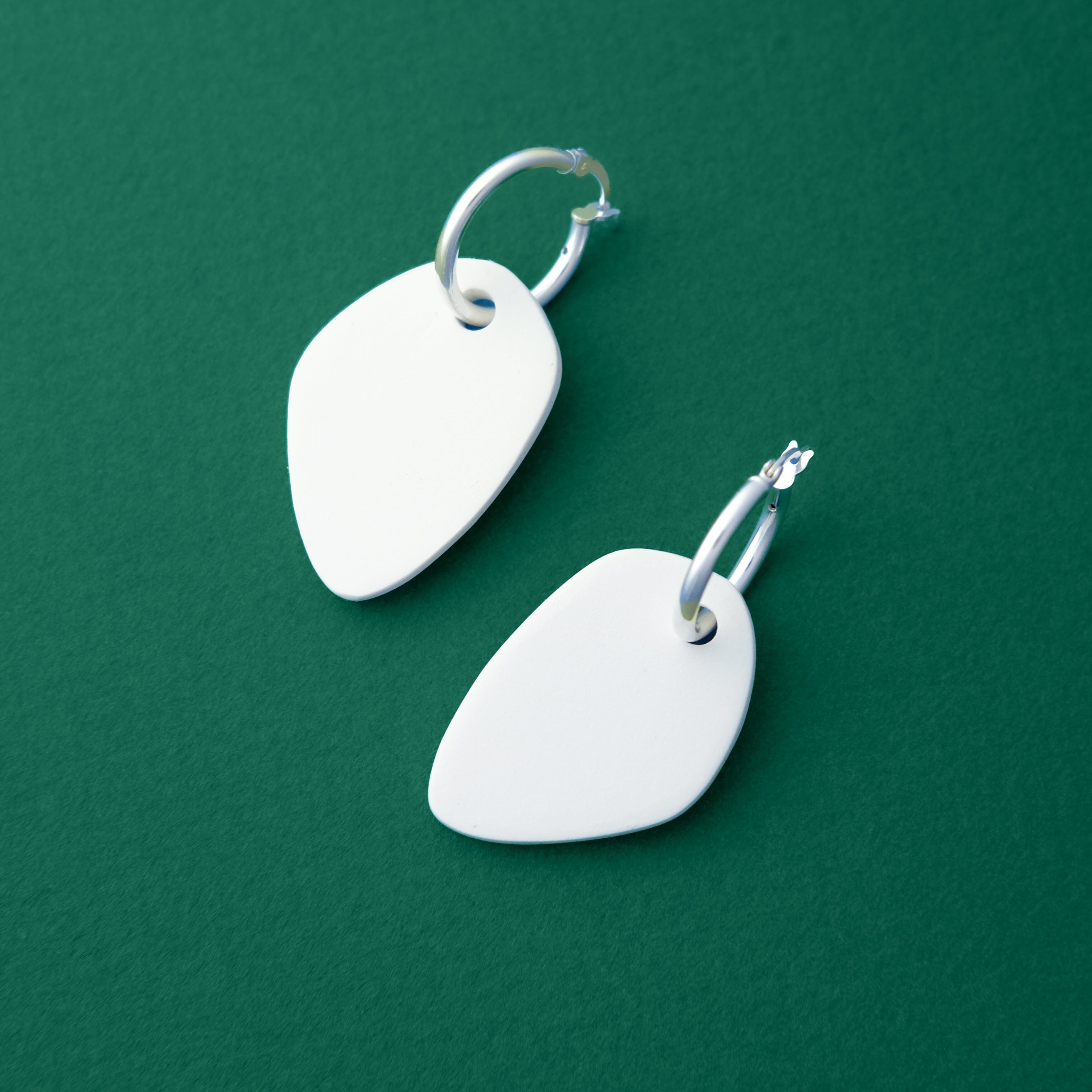 Organic shapes, hoop charm dangly earrings Calder inspired in white #color_white