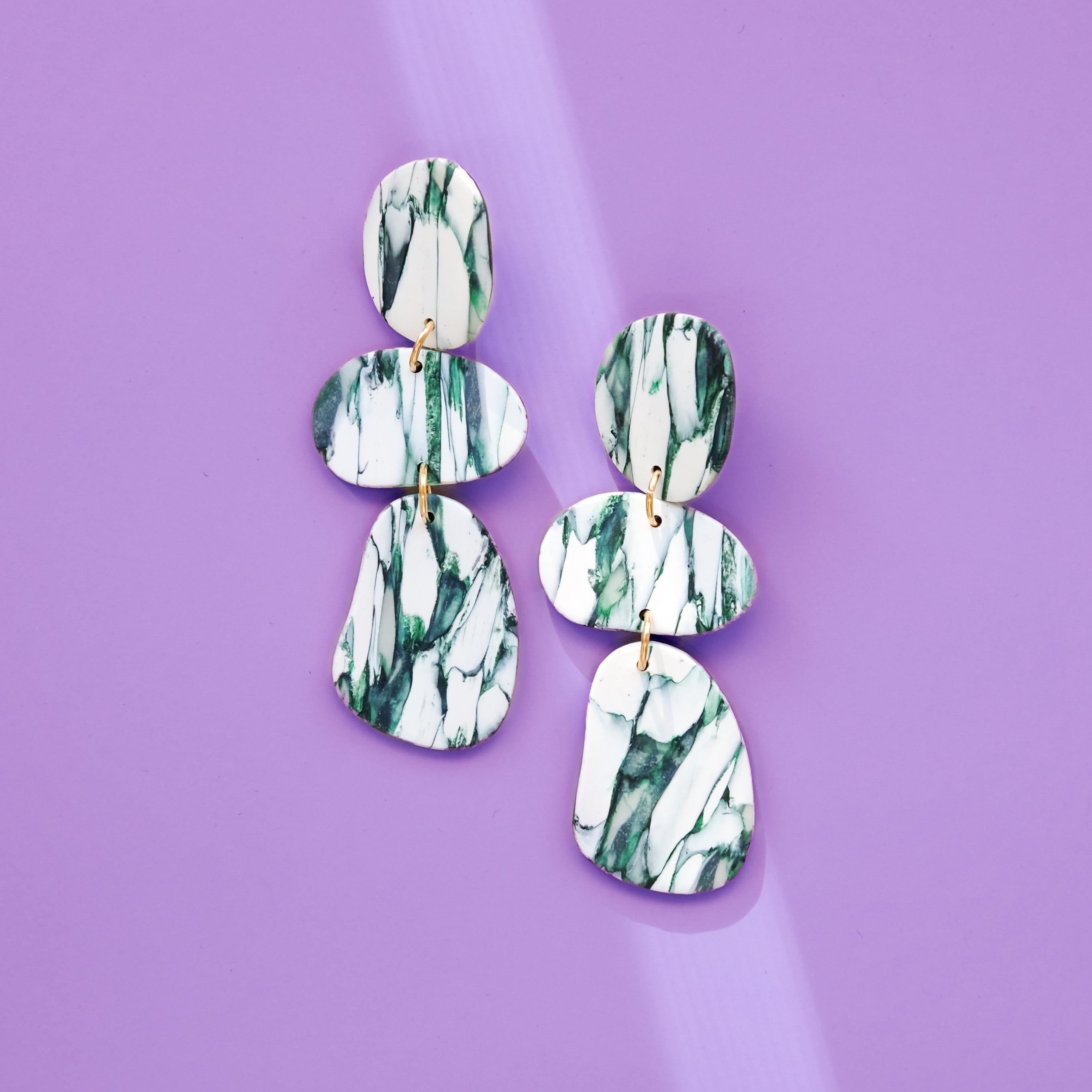 Celestia dangly earrings in italian marble pattern #color_forest-marble