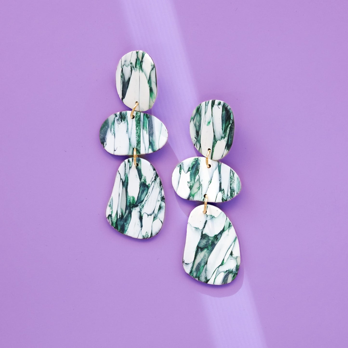Elegant statement Celestia dangly earrings in italian marble pattern #color_forest-marble