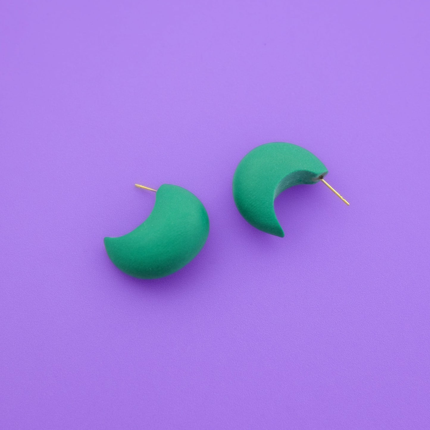 Chunky chubby huggie hoops earrings, statement studs in Emerald #color_emerald
