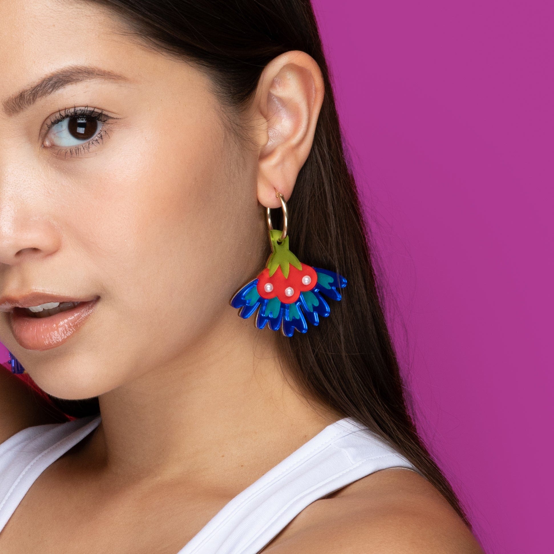 cosmos flower dangly hoop earrings in blue #color_blue