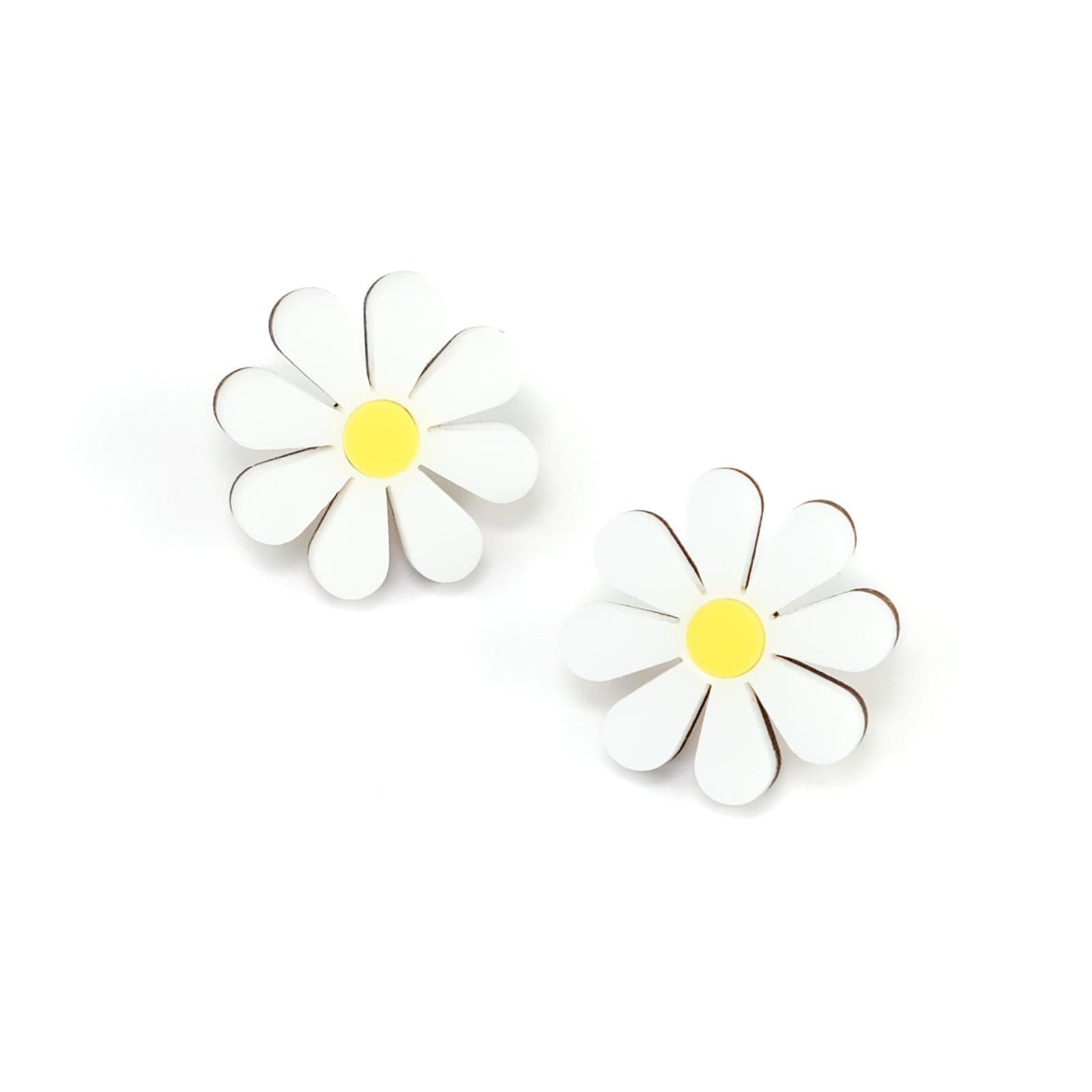 Cute and dainty daisy stud earrings with hypoallergenic titanium posts hand-made in NYC #color_white