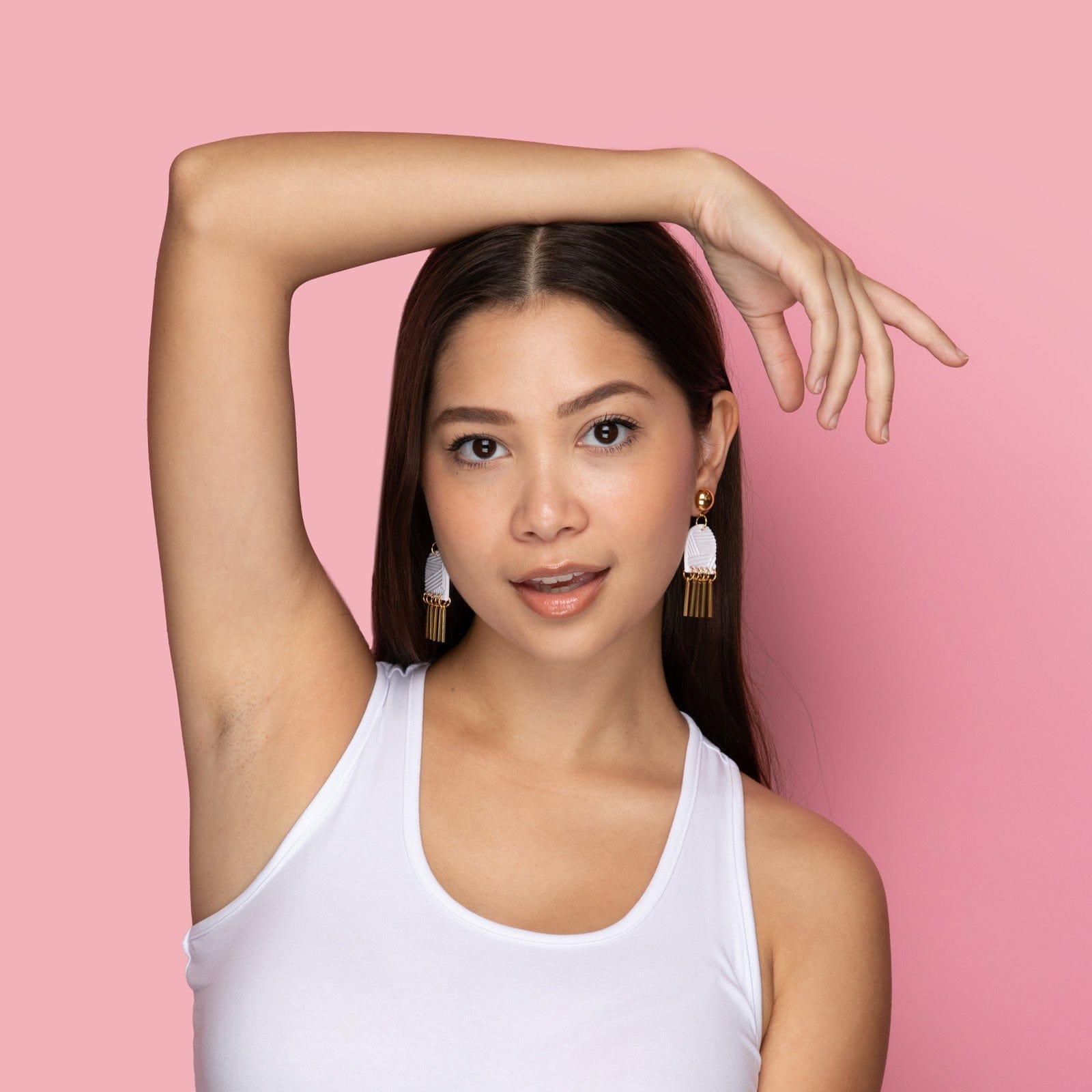 Dancing Domes dangly earrings in white and gold #color_white-textured-lines