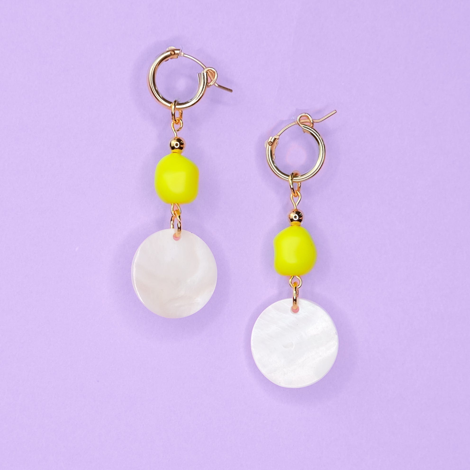 Dangly hoop earrings in neon yellow and pearl