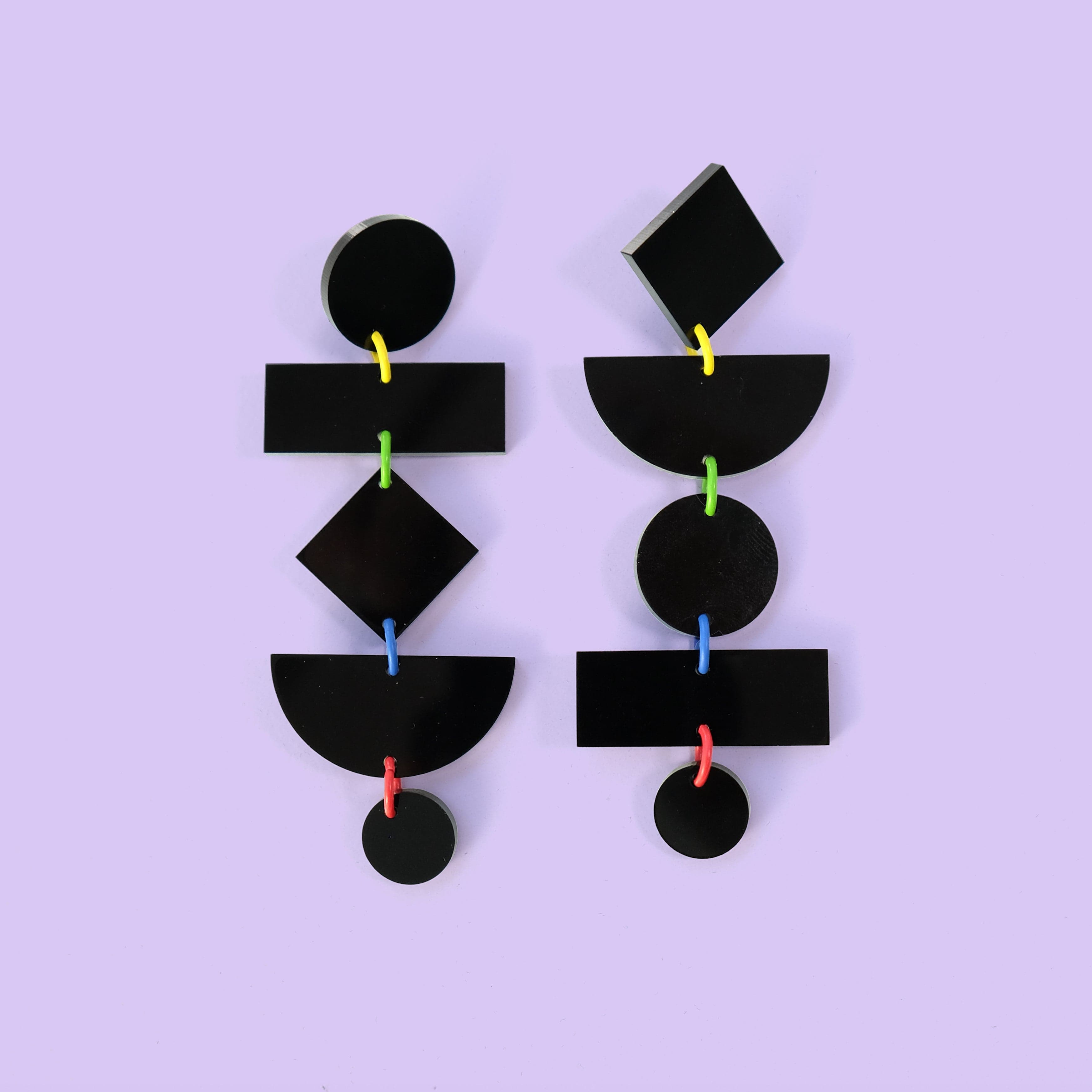 Asymmetrical translucent Geometric dangly statement earrings in black with multi-color jump rings #color_black