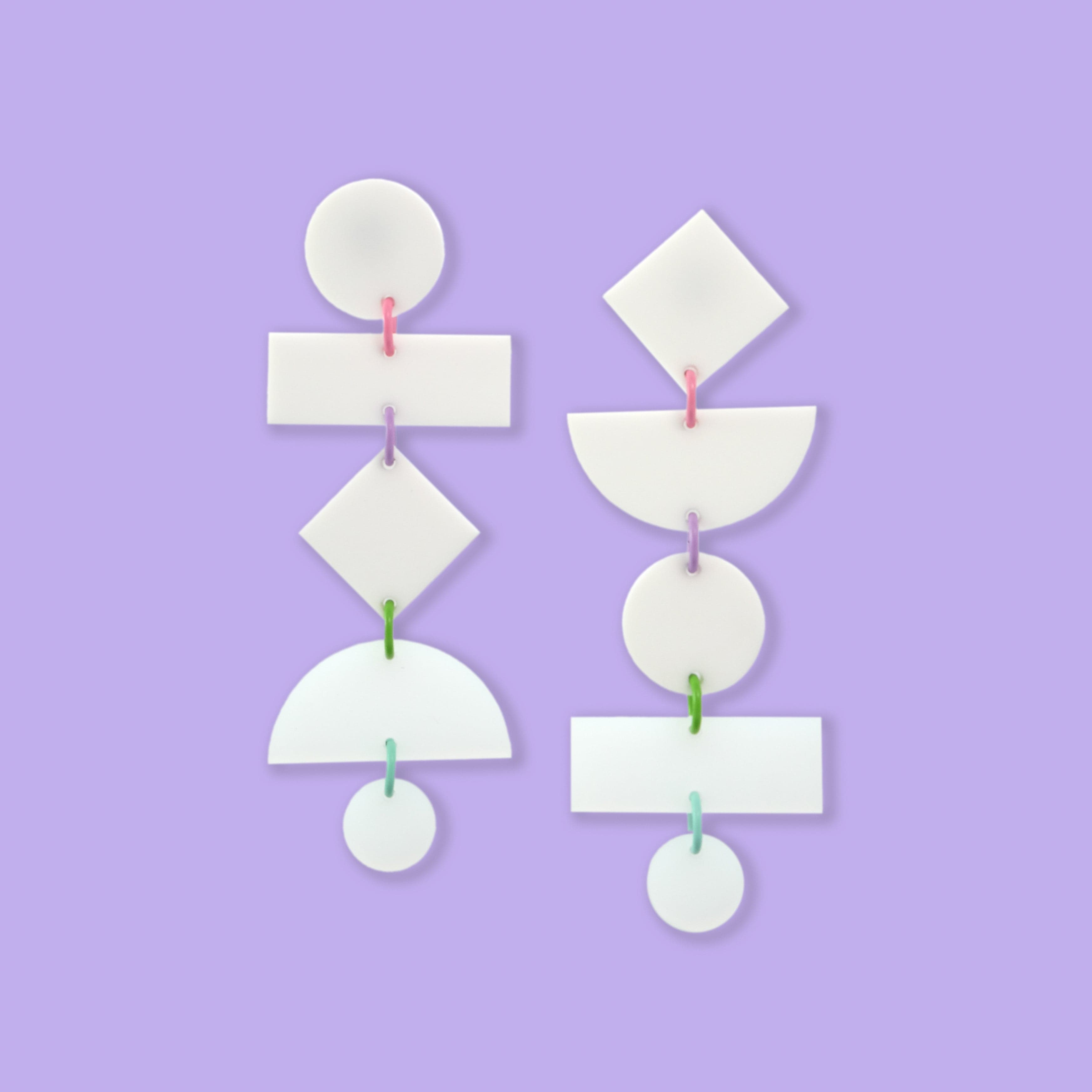 Asymmetrical translucent Geometric dangly statement earrings in white with pastel multi-color jump rings #color_white