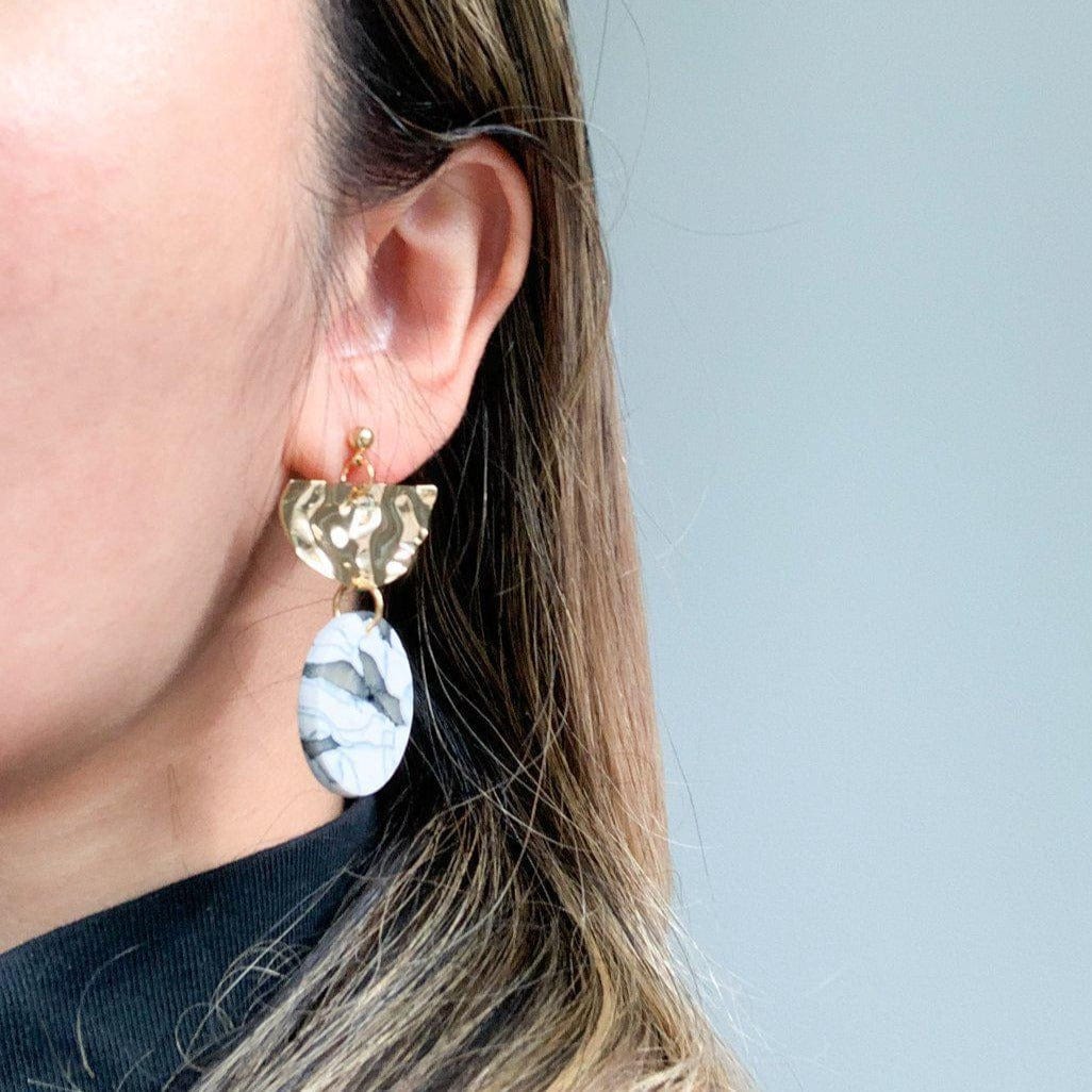 Elegant and blingy Giada Dangly Earrings in green marble with hammered gold #color_forest-marble