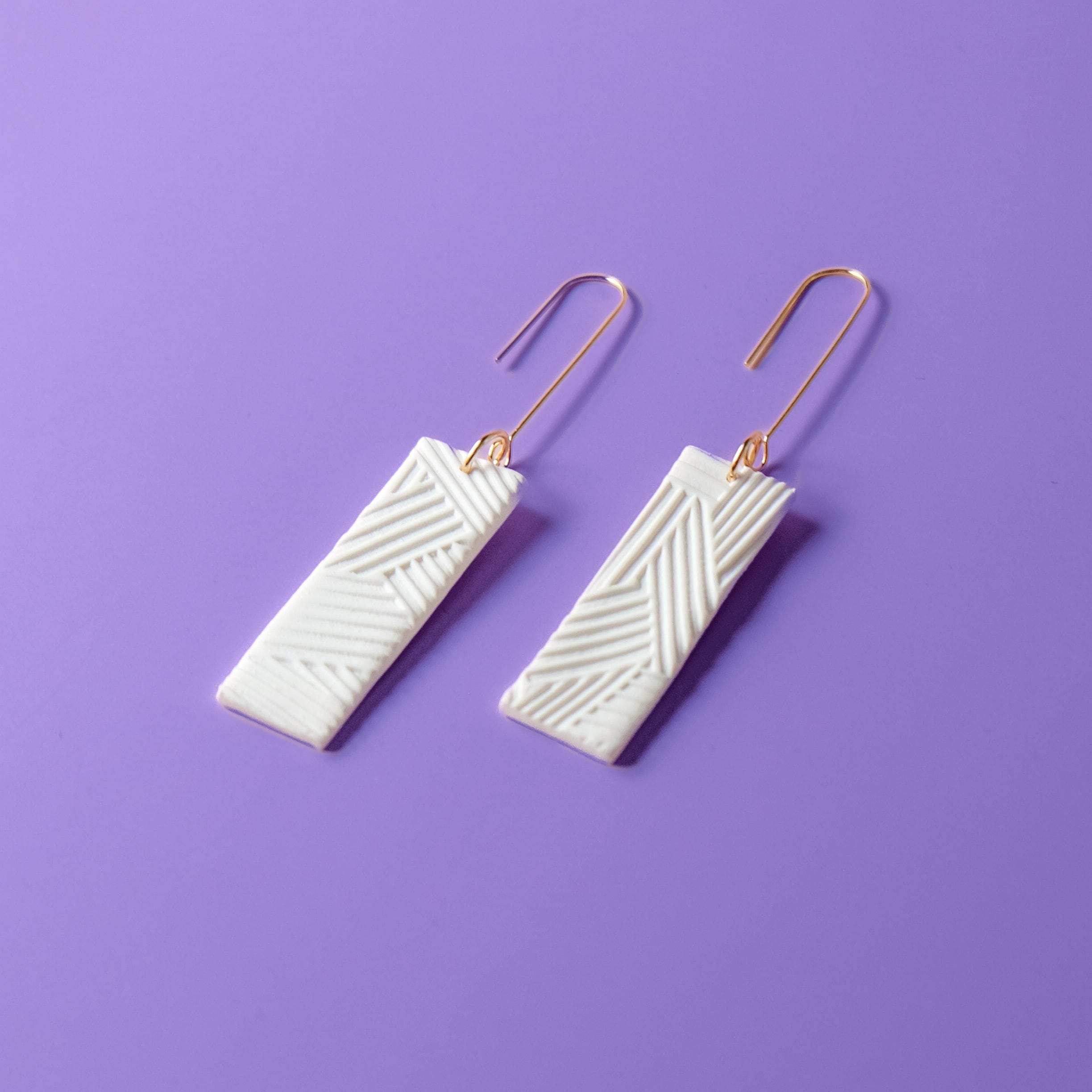 Giulia Dangles Earrings #color_white-textured-lines